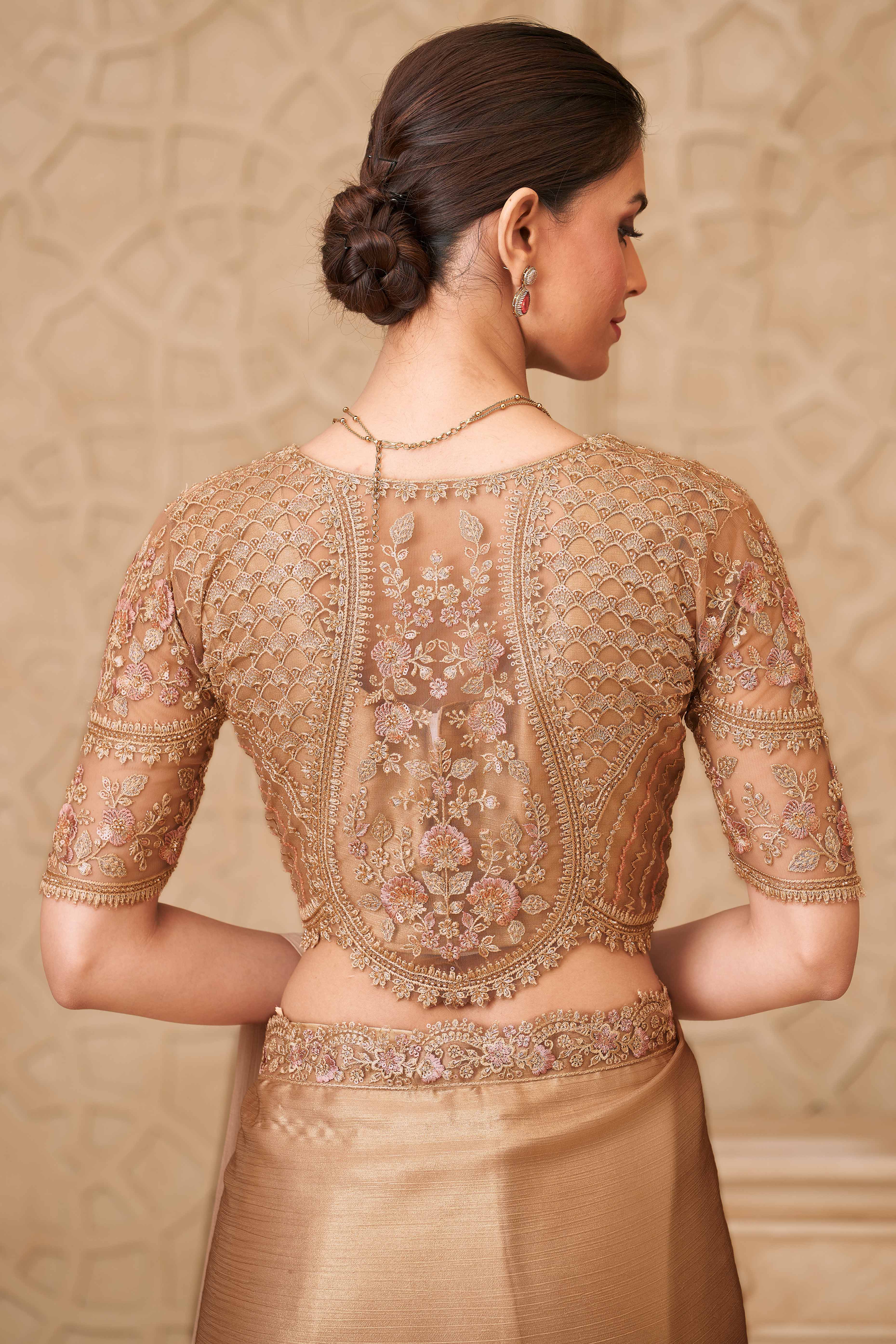 Shimmering Beige Georgette Saree with Graceful Thread Embellishment and Sequins