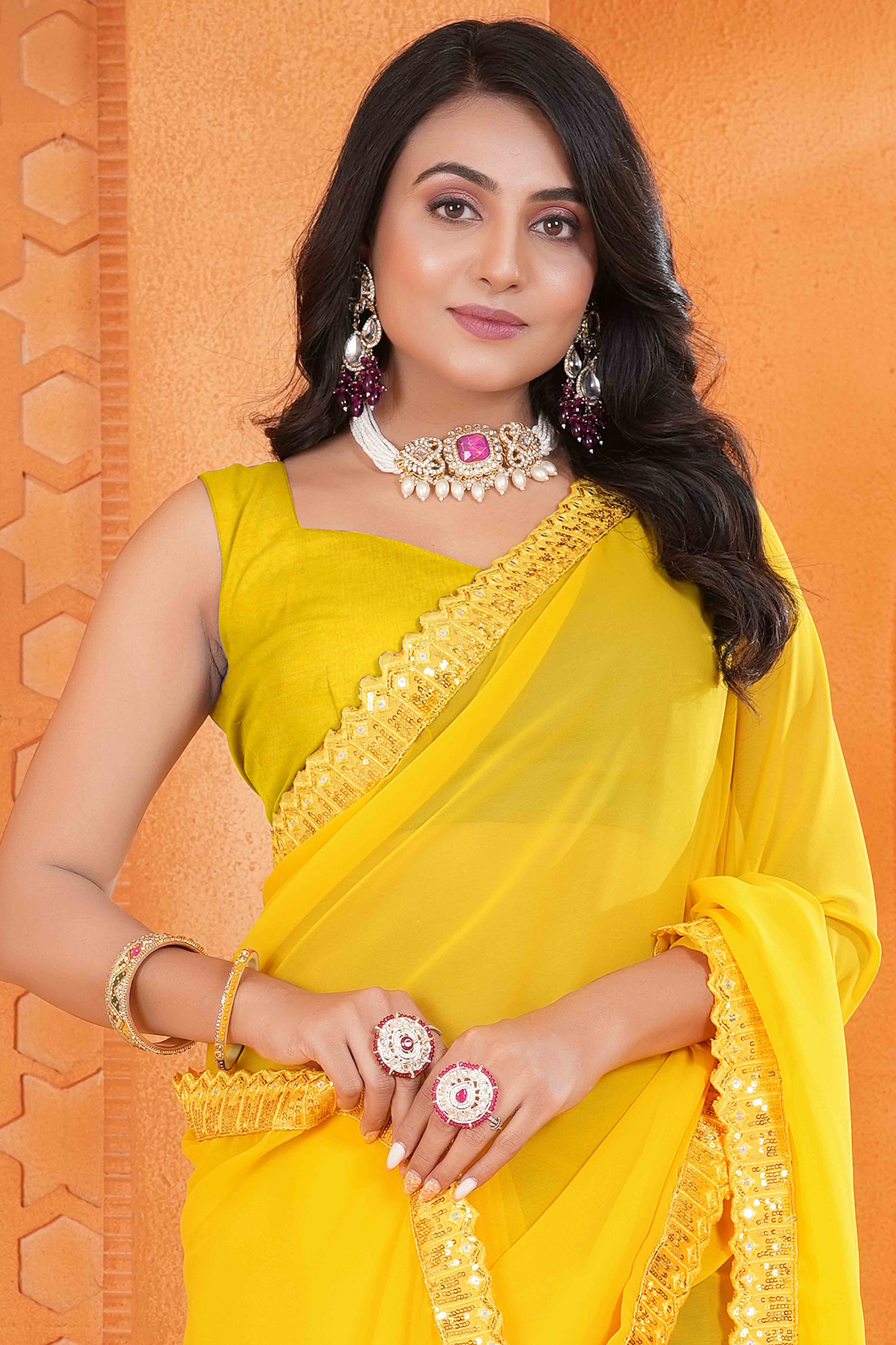 Yellow Georgette Saree with Subtle Solid Pattern and Sequins Border