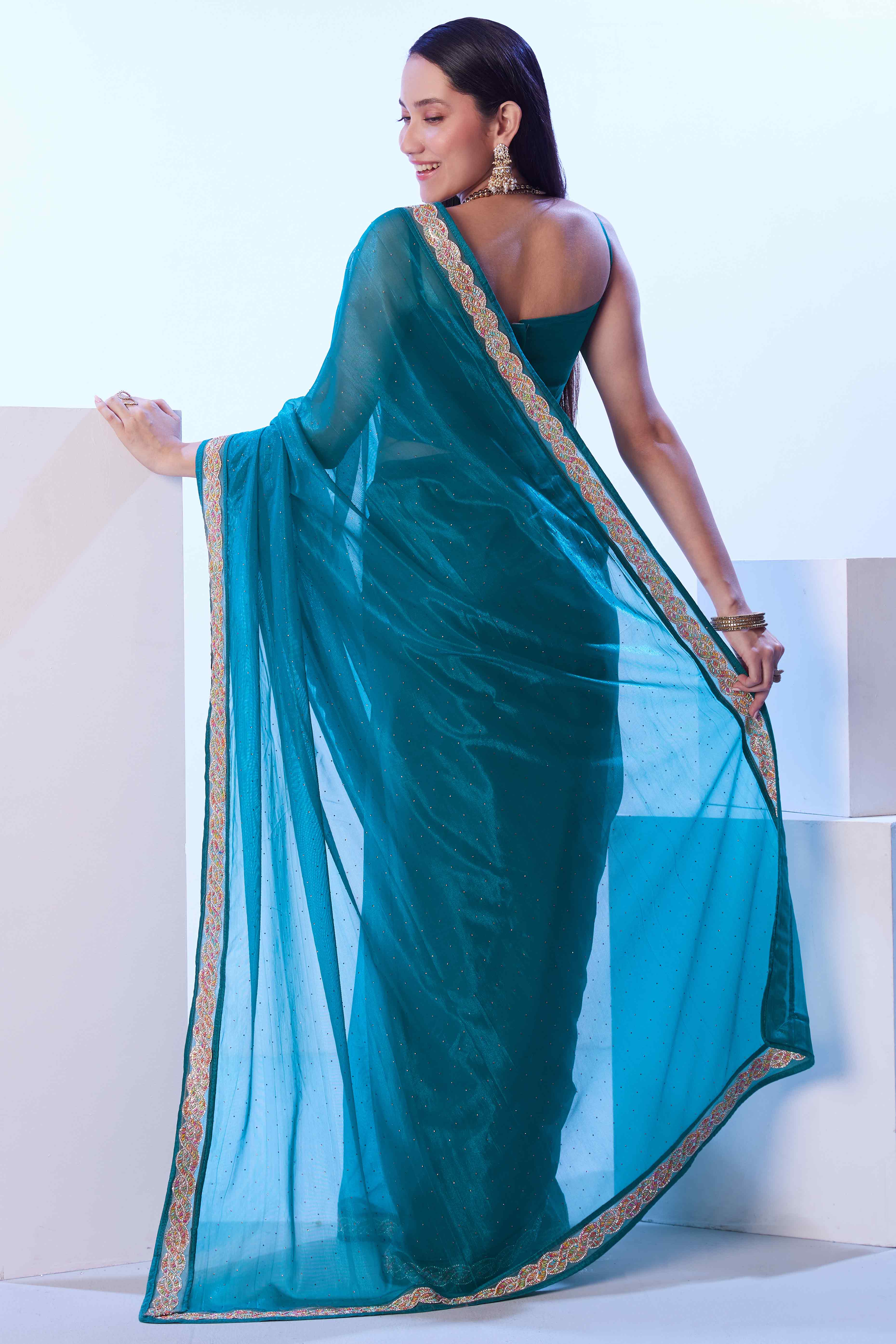 Teal Stone Work Net Solid Embroidered Saree for Party Wear