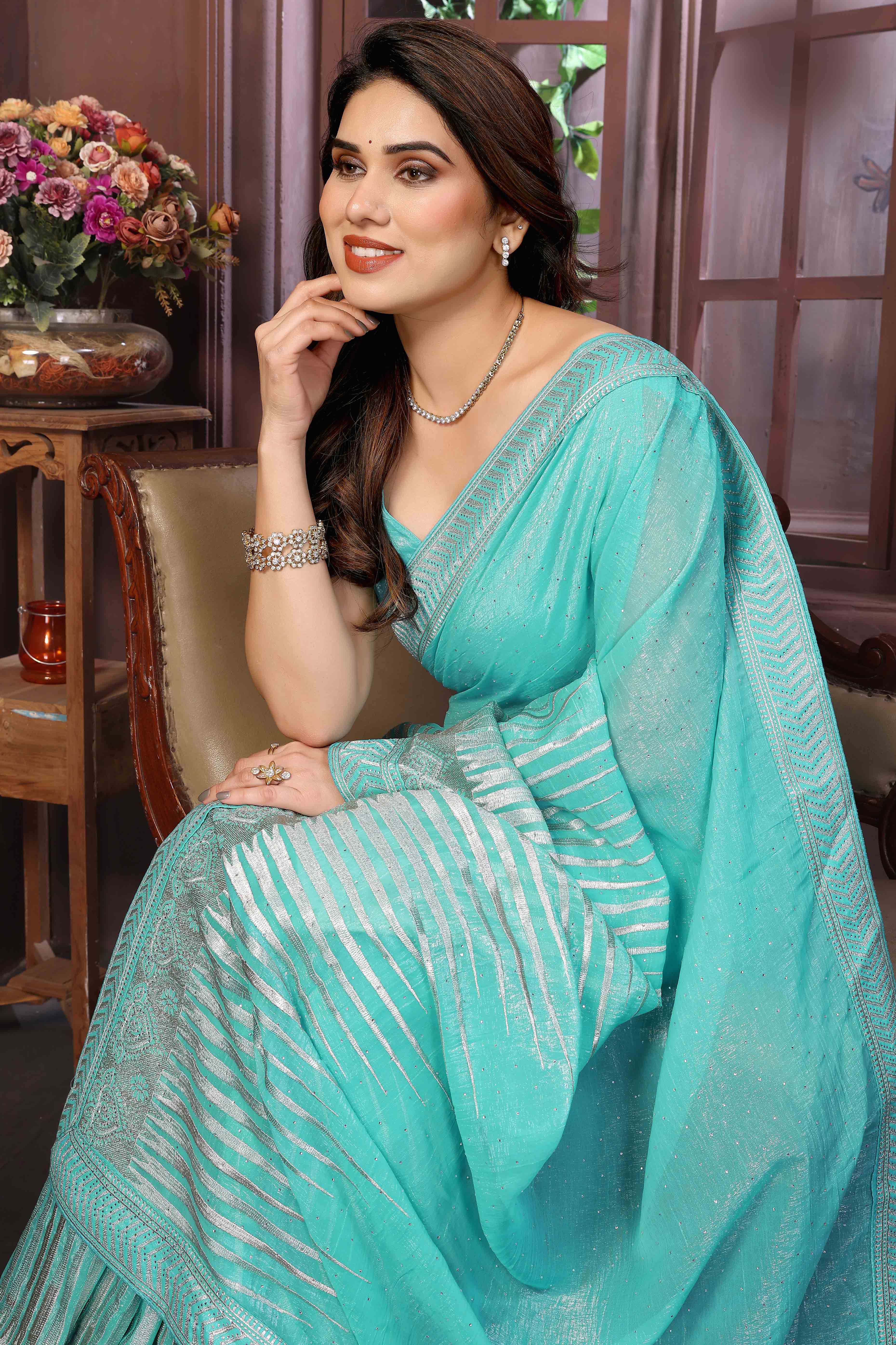 Swarovski Work Saree In Turquoise With Delicate Floral Zari Border