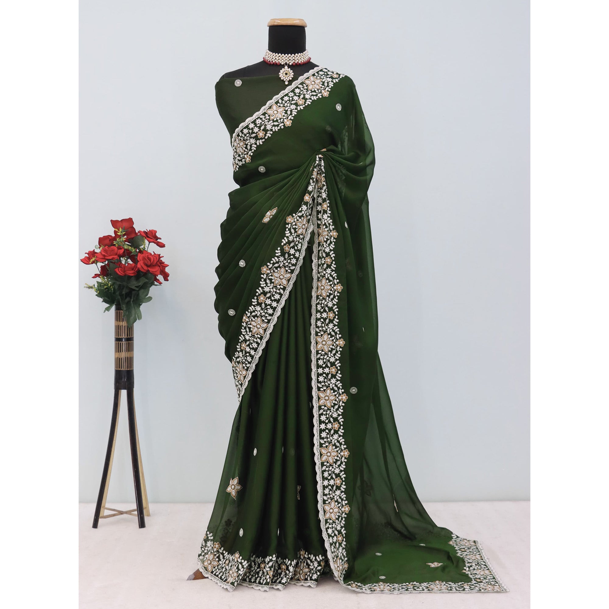 Green Designer Art Silk Saree Enhanced with Fine Floral Embroidery Work