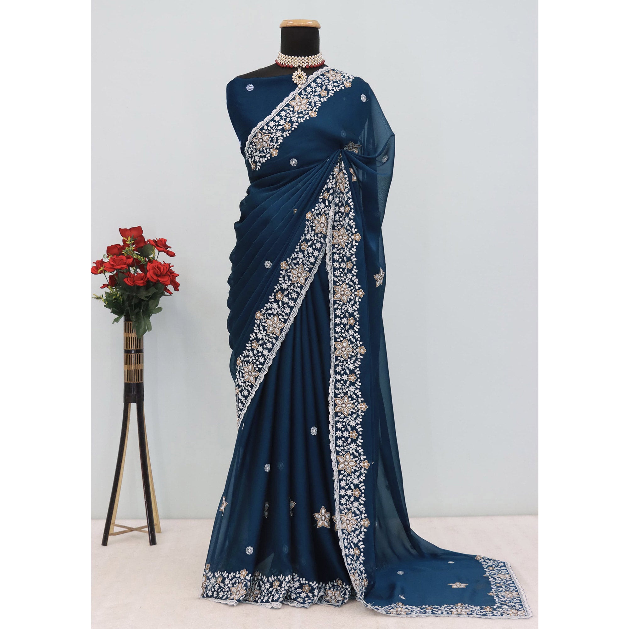 Teal Designer Art Silk Saree Enhanced with Fine Floral Embroidery Work