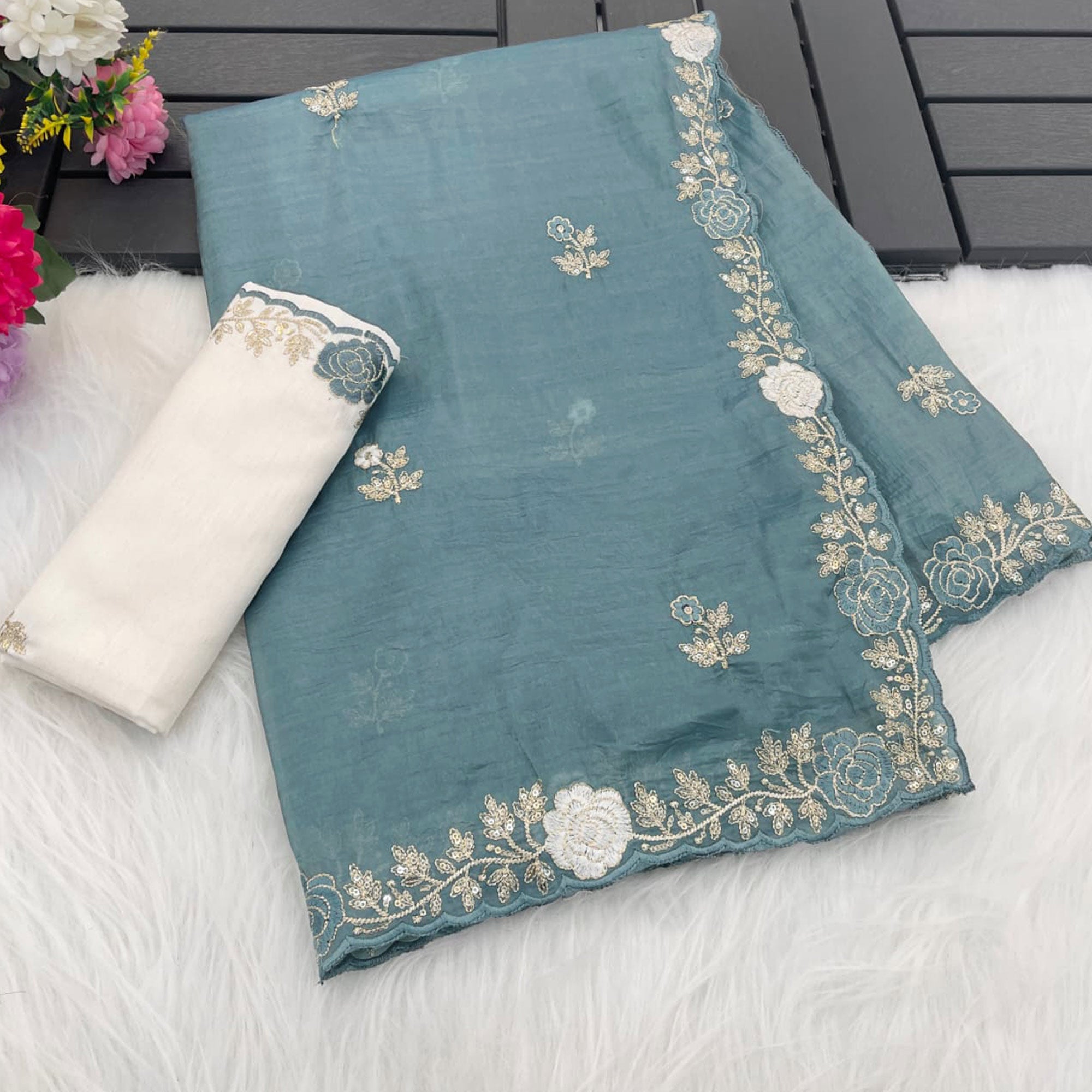 Blue Lightweight Georgette Crush Saree Adorned with Delicate Floral Embroidery