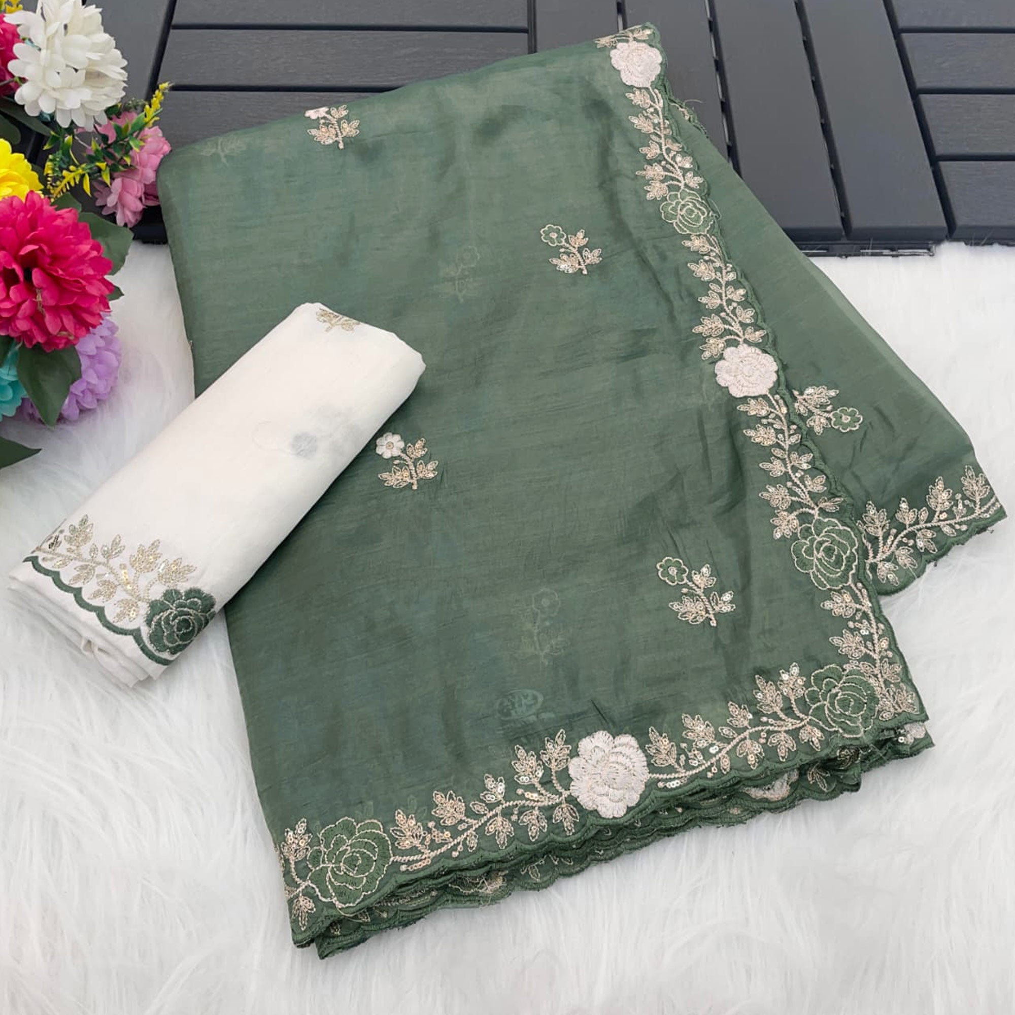 Green Lightweight Georgette Crush Saree Adorned with Delicate Floral Embroidery