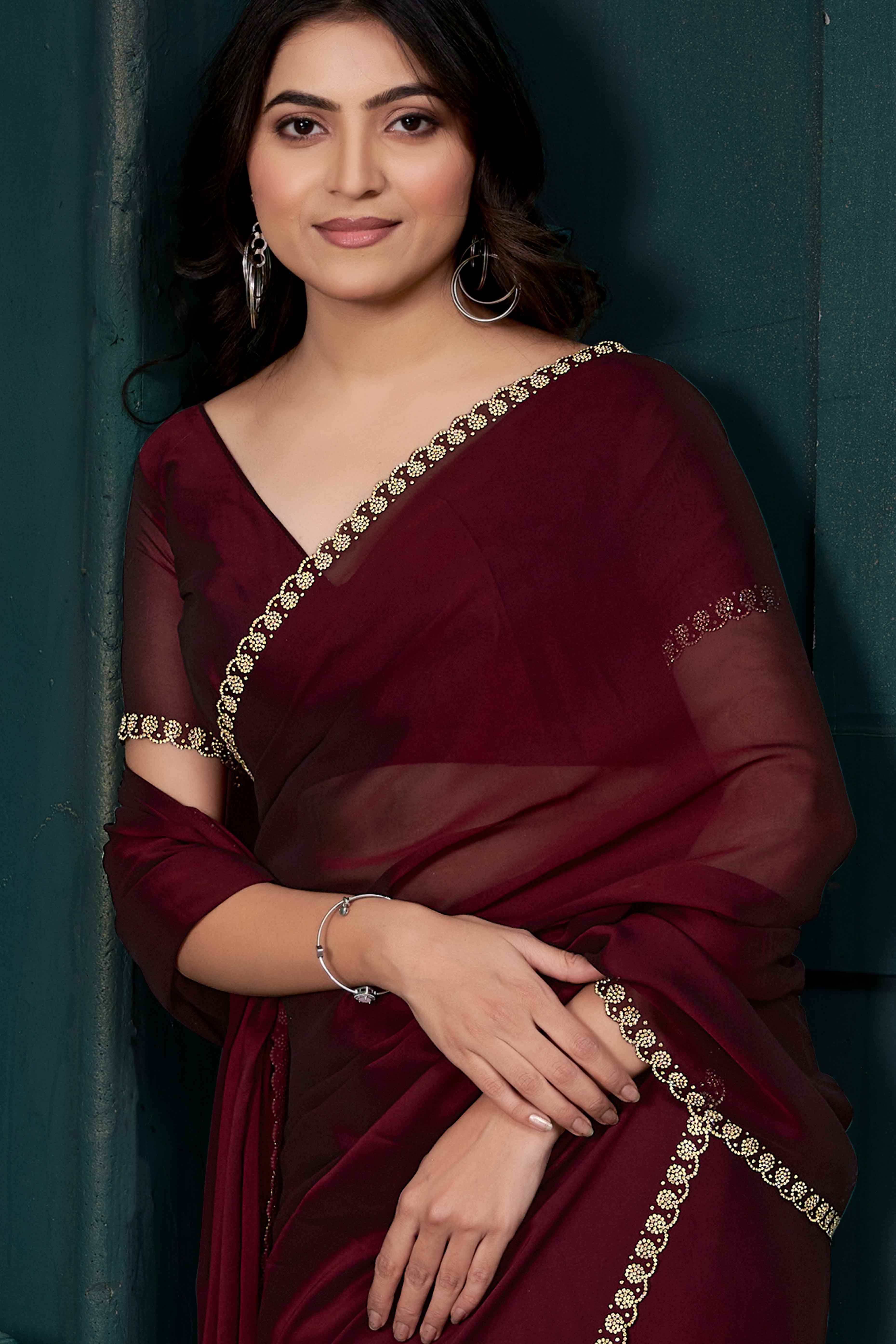Maroon Crepe Silk Solid Saree with Elegant Zarkan Border Detailing