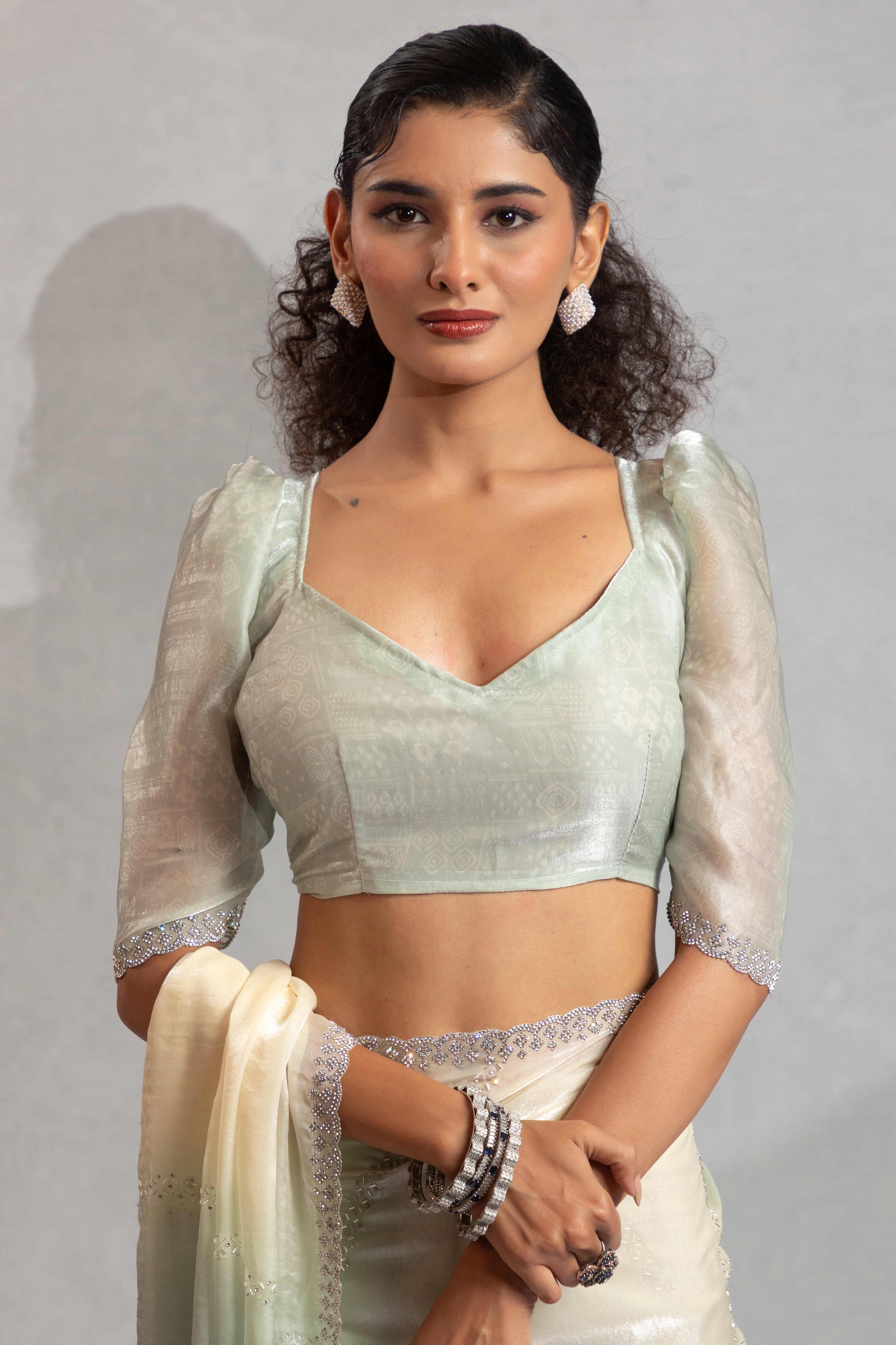 Celadon Green & Off White Satin Silk Saree Decorated With Stone Embellishments