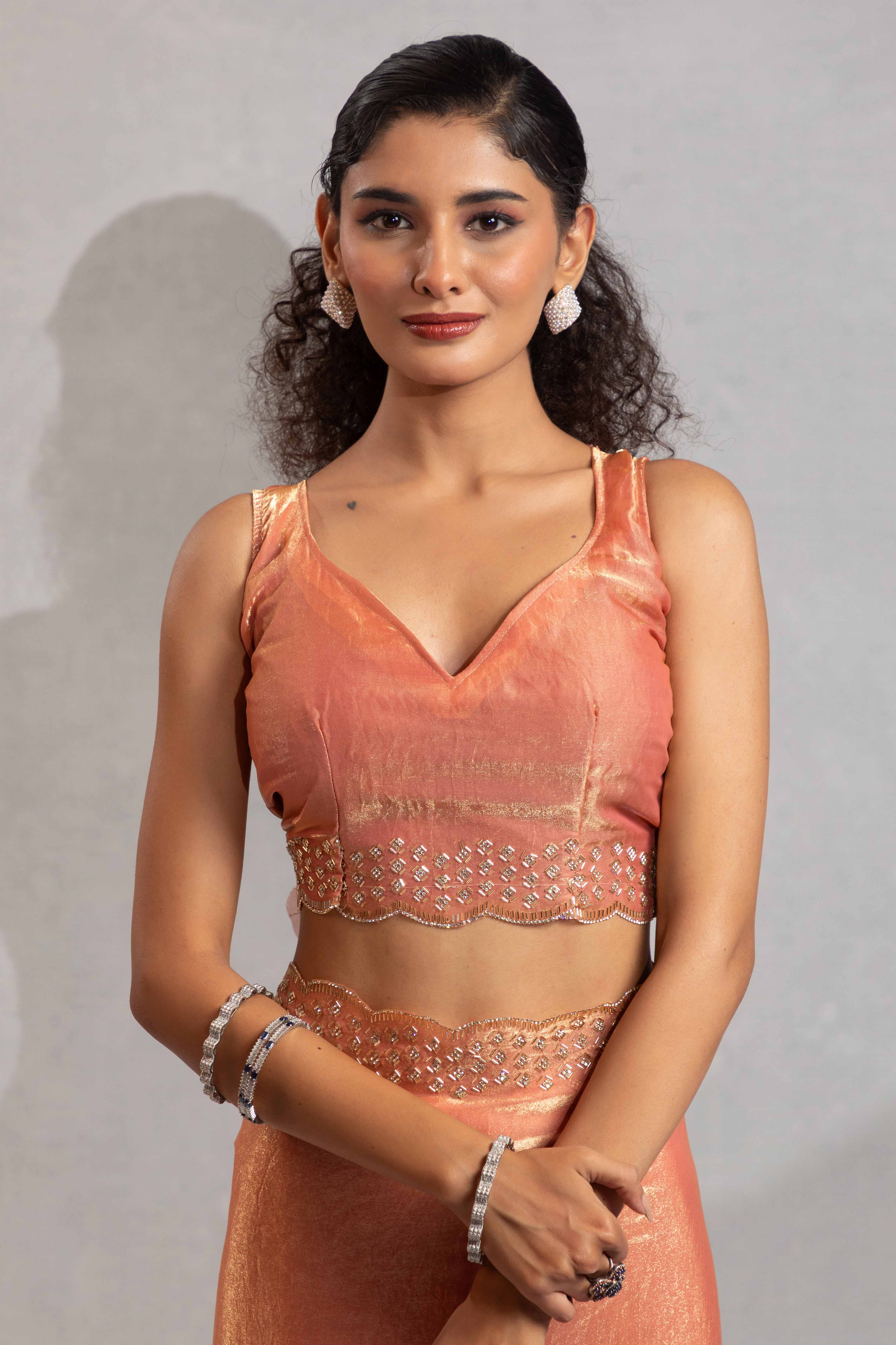 Coral Peach Satin Saree with Glamorous Stone Embellishment