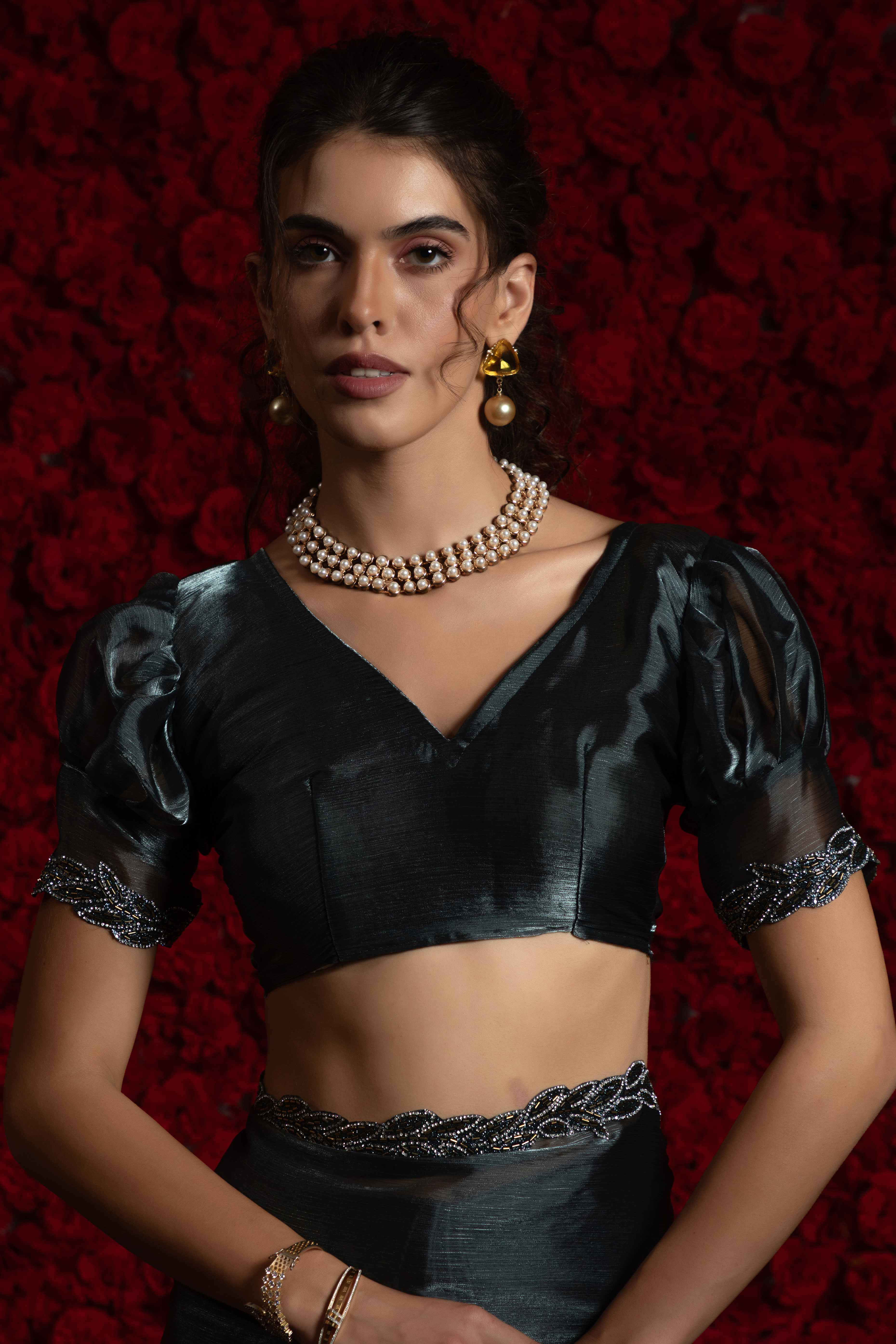 Grey Solid Tissue Chiffon Saree Accented With Elegant Zarkan Work Border