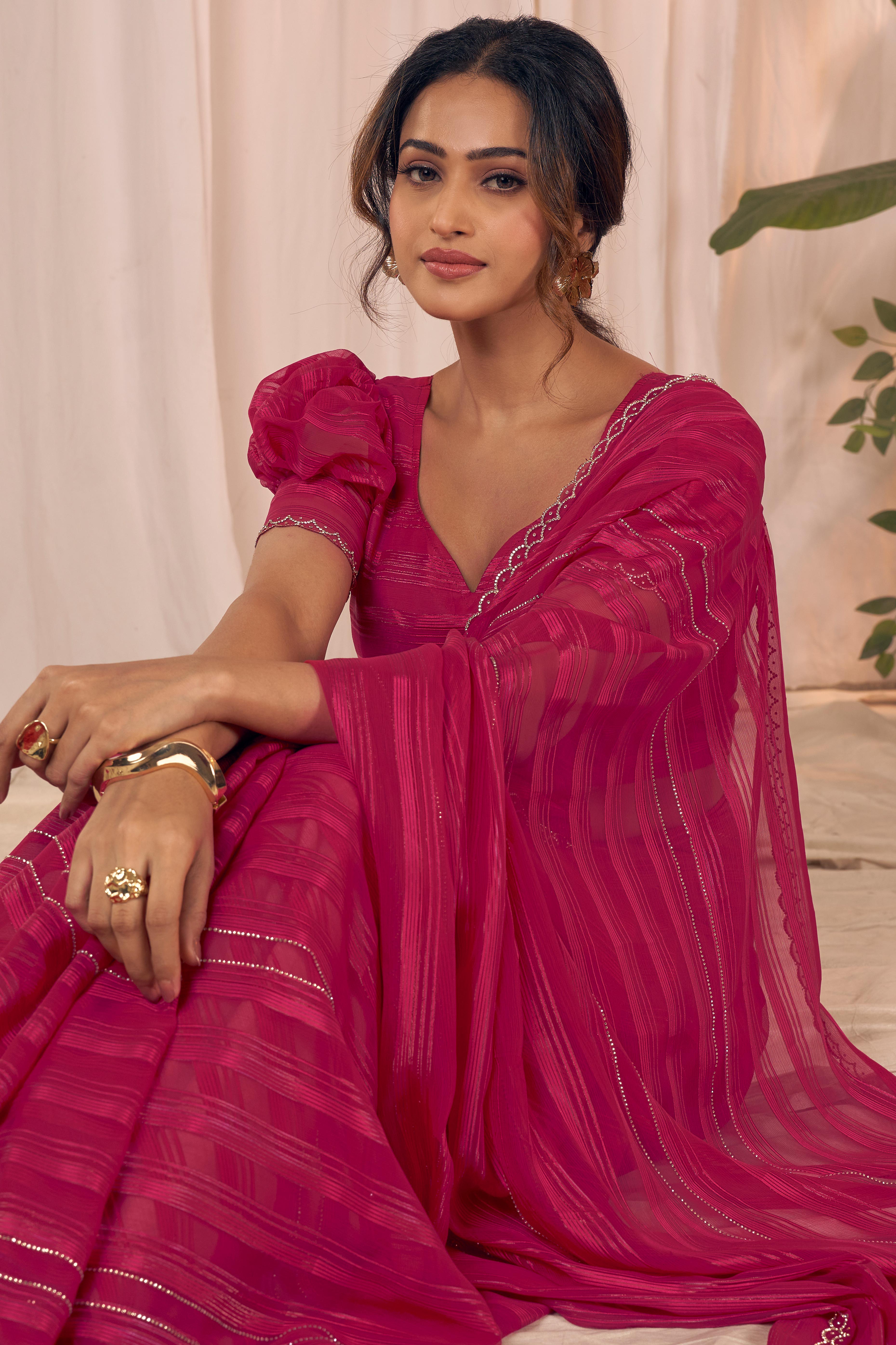 Rose pink Striped Designer Georgette Saree Adorned With An Elegant Zarkan Cutwork Border