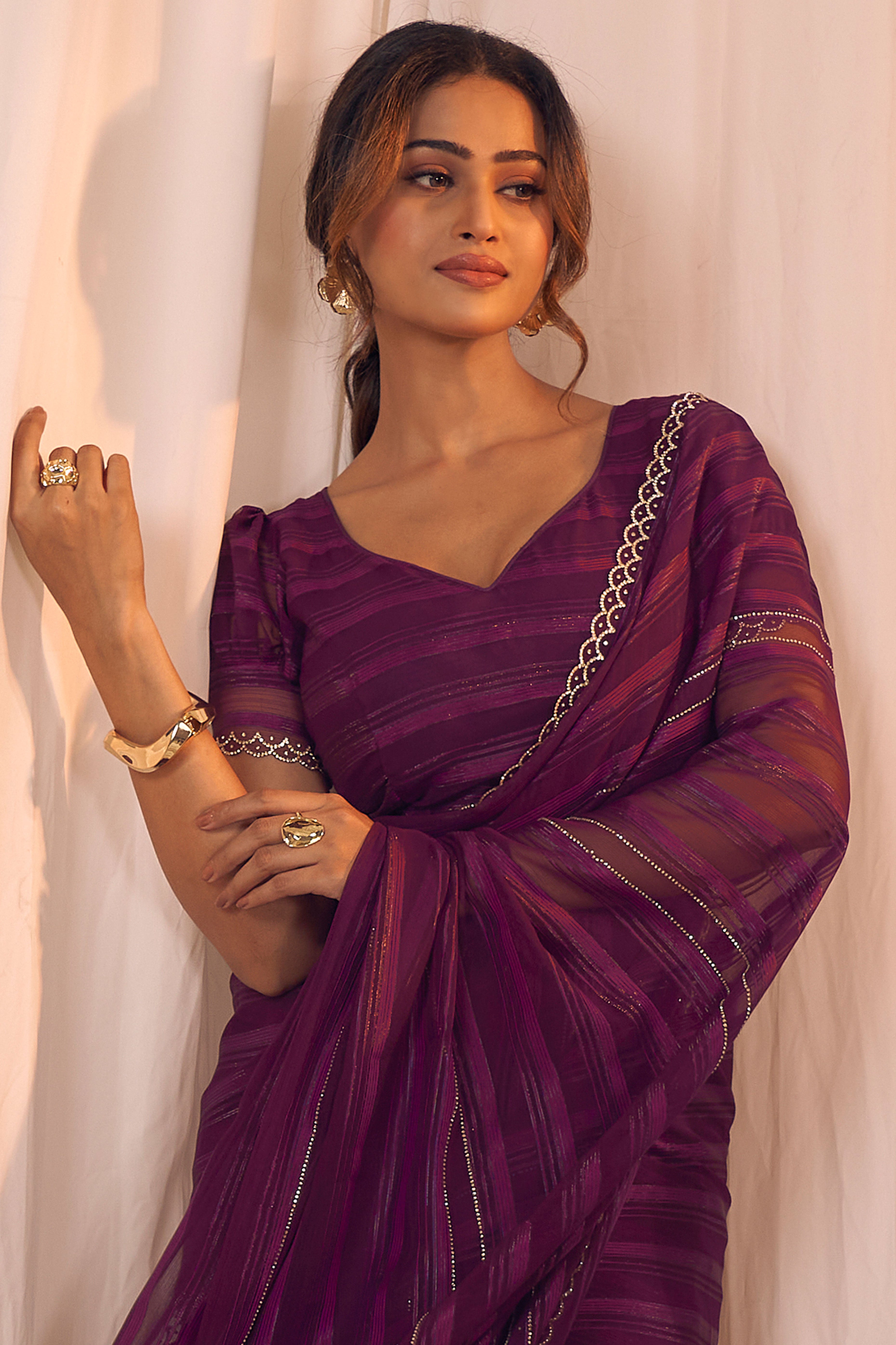 Wine Striped Designer Georgette Saree Adorned With An Elegant Zarkan Cutwork Border