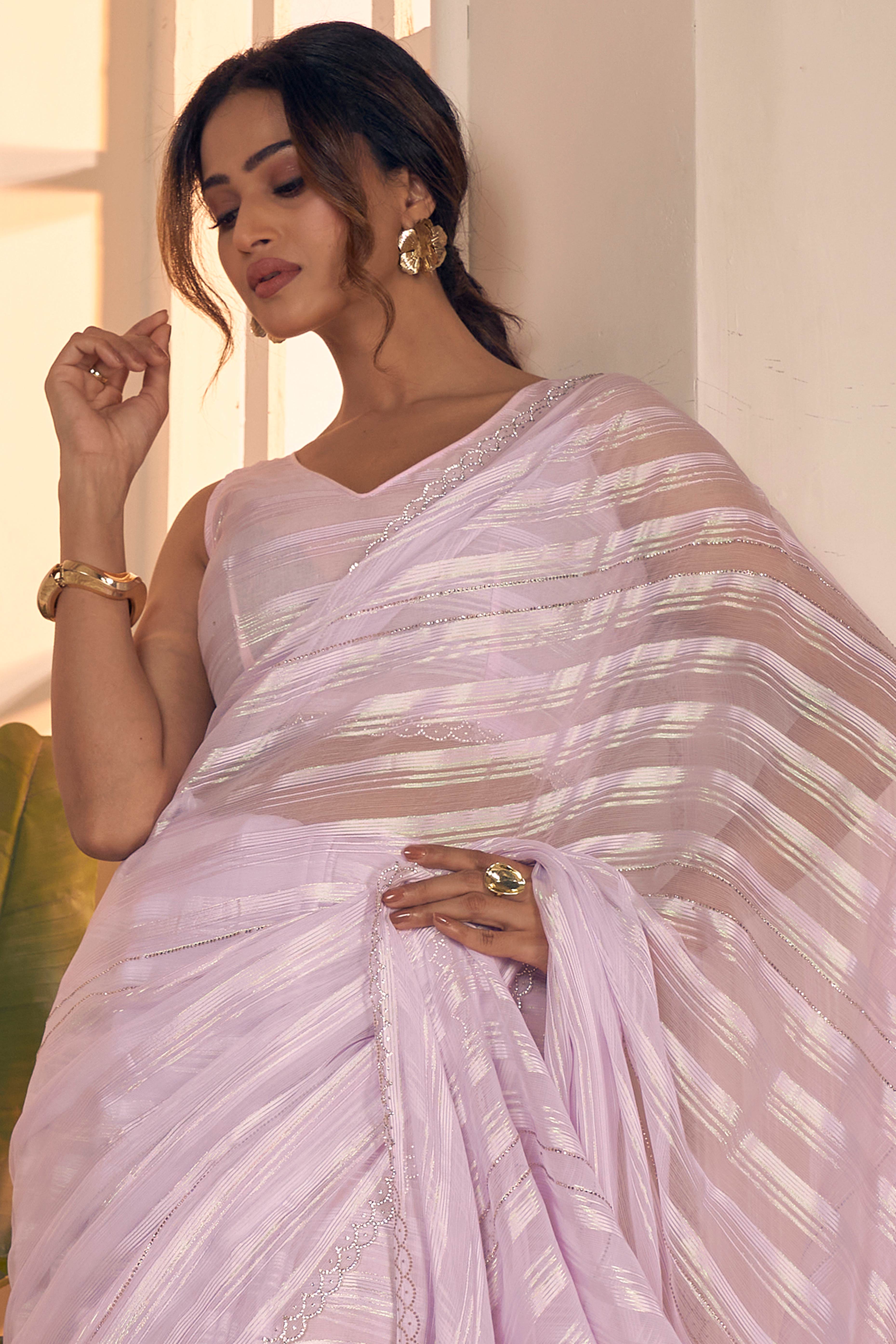 Light Lavender Striped Georgette Saree With Sparkling Zarkan Work & An Elegant Cutwork Border