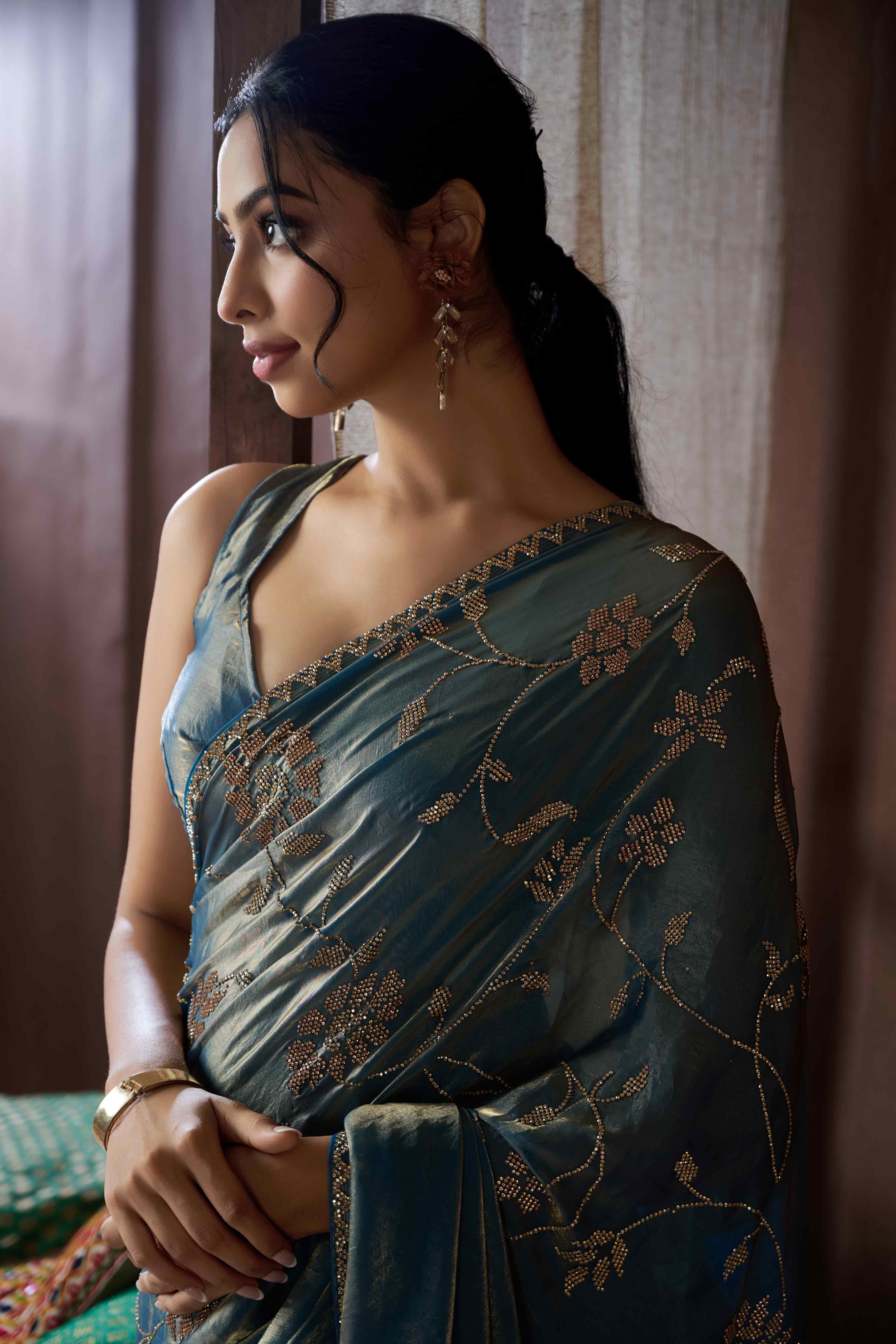 Sky Blue Satin Saree with Exquisite Stone Embellishments