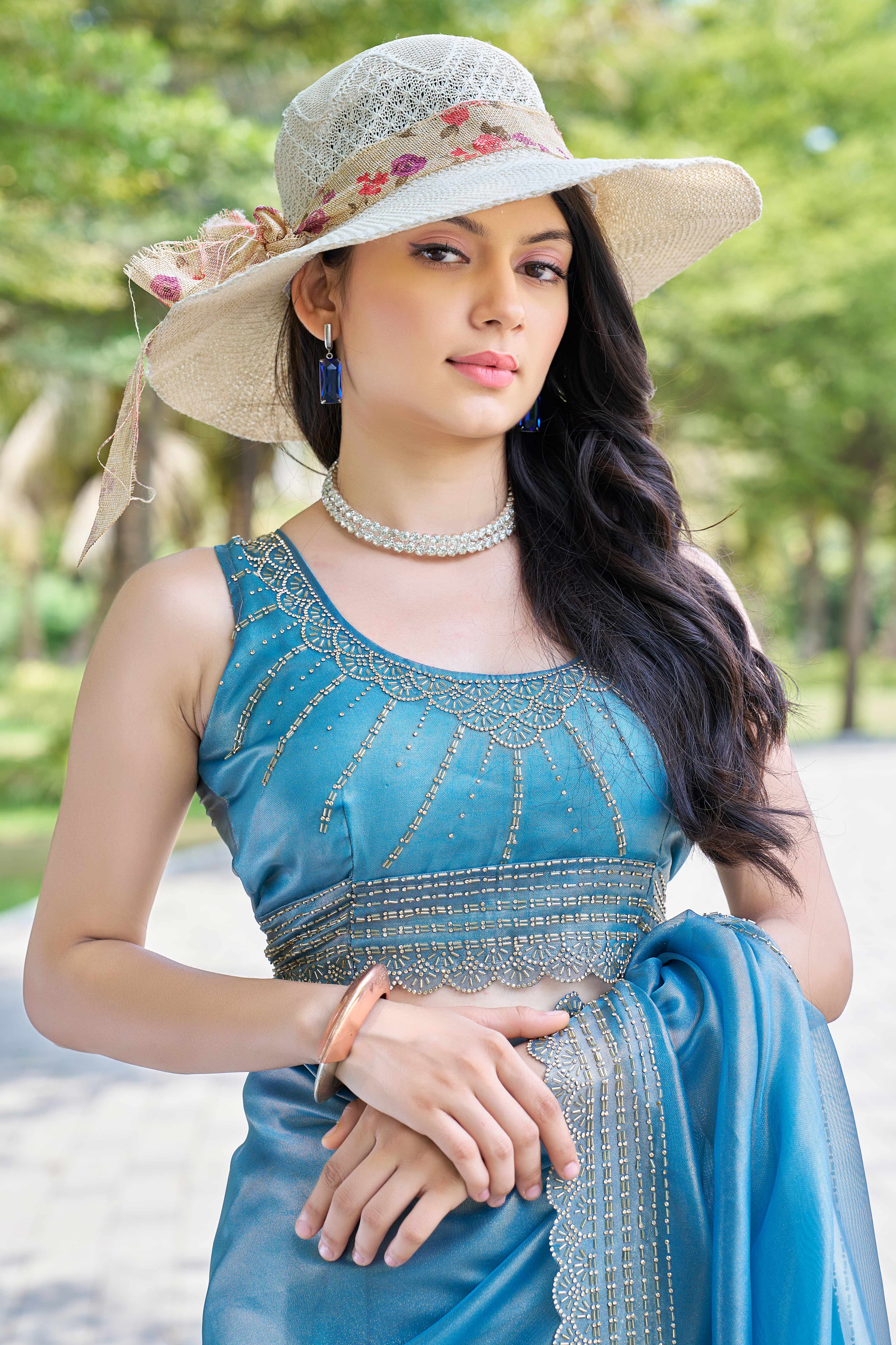 Teal Soft Organza Saree with Stone Embellishments Work