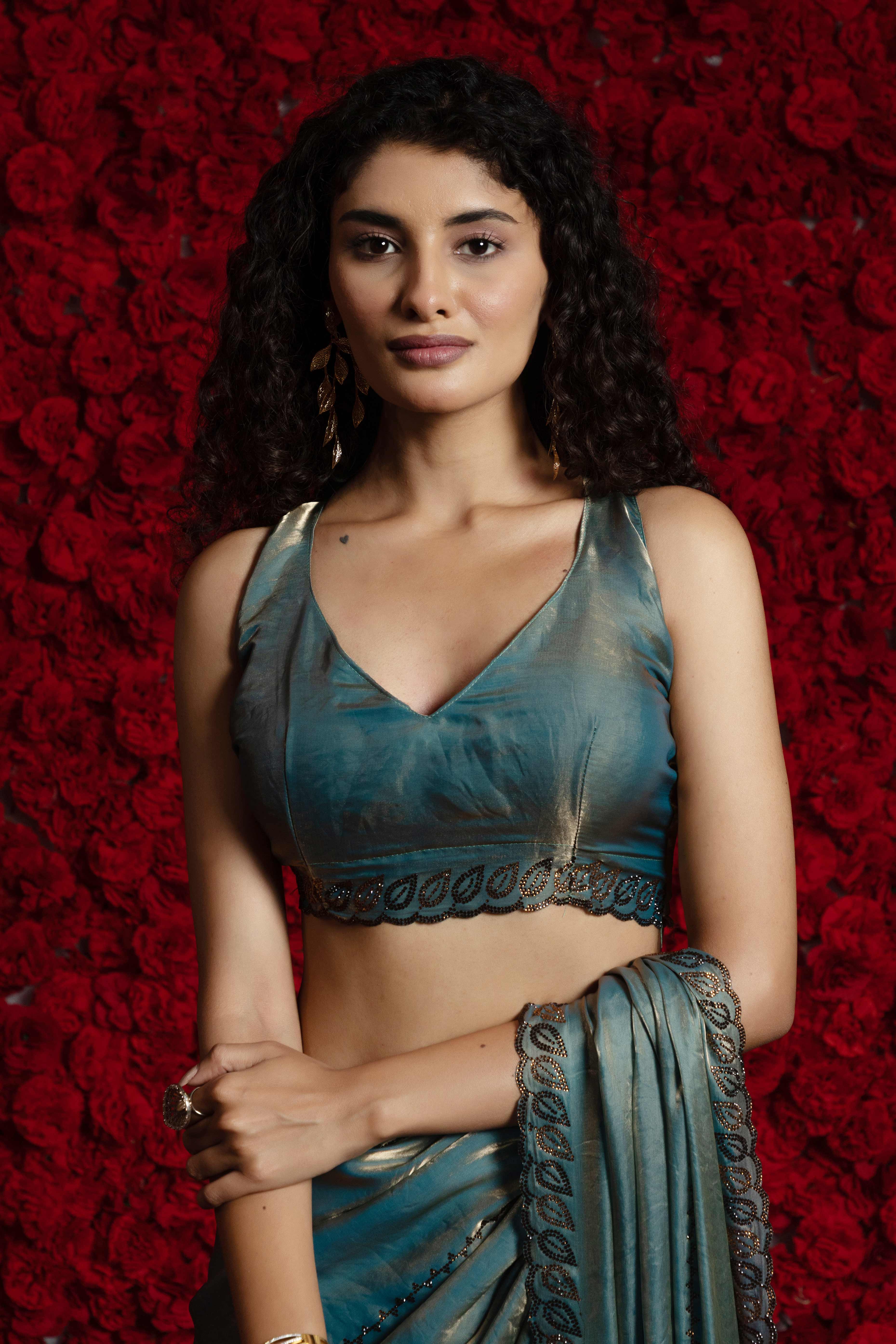 Teal Satin Silk Saree with Dazzling Stone Embellishments for Special Occasions