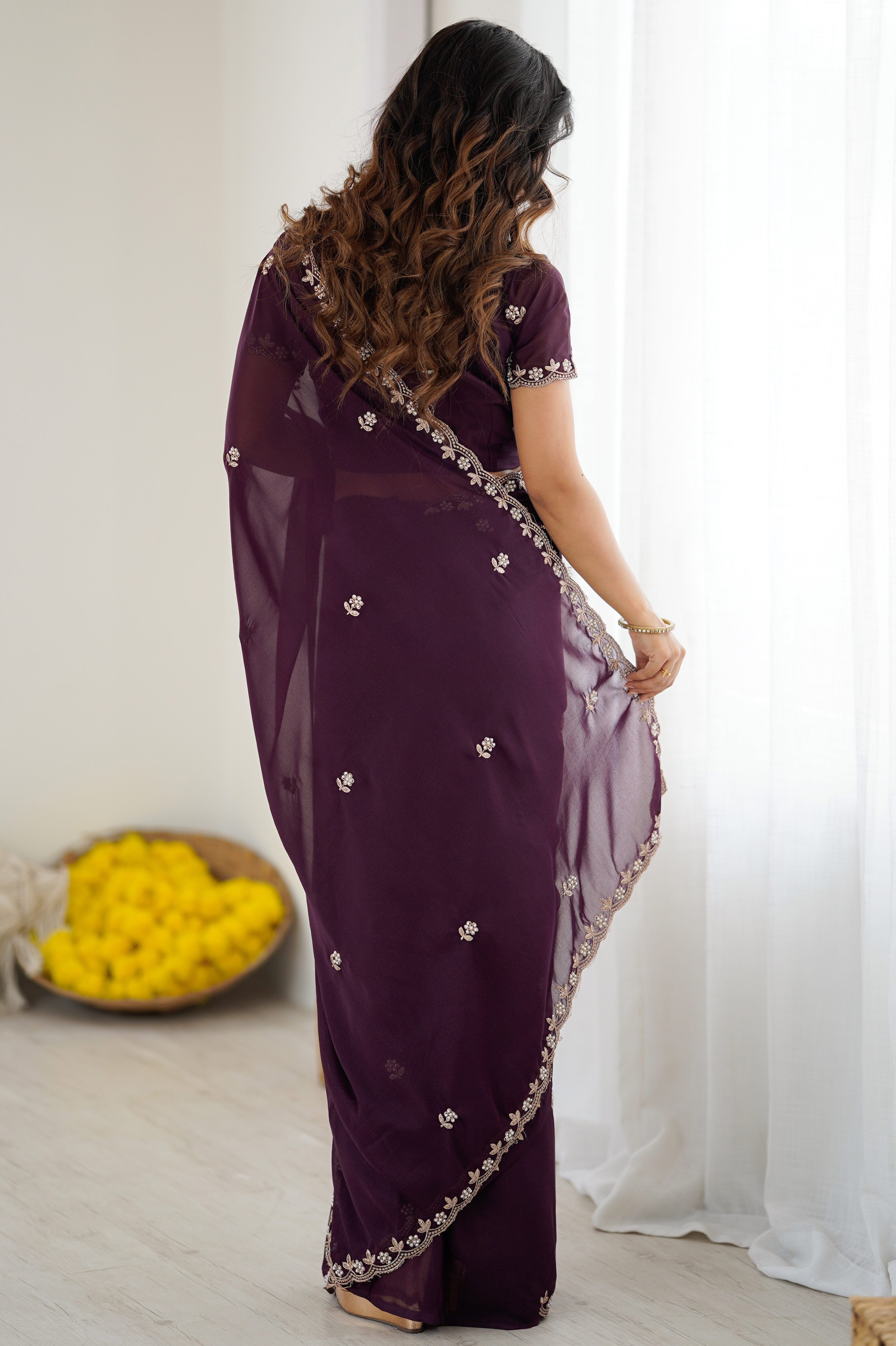 Wine Partywear Star Georgette Saree Adorned with Floral Embroidery and Beads Work