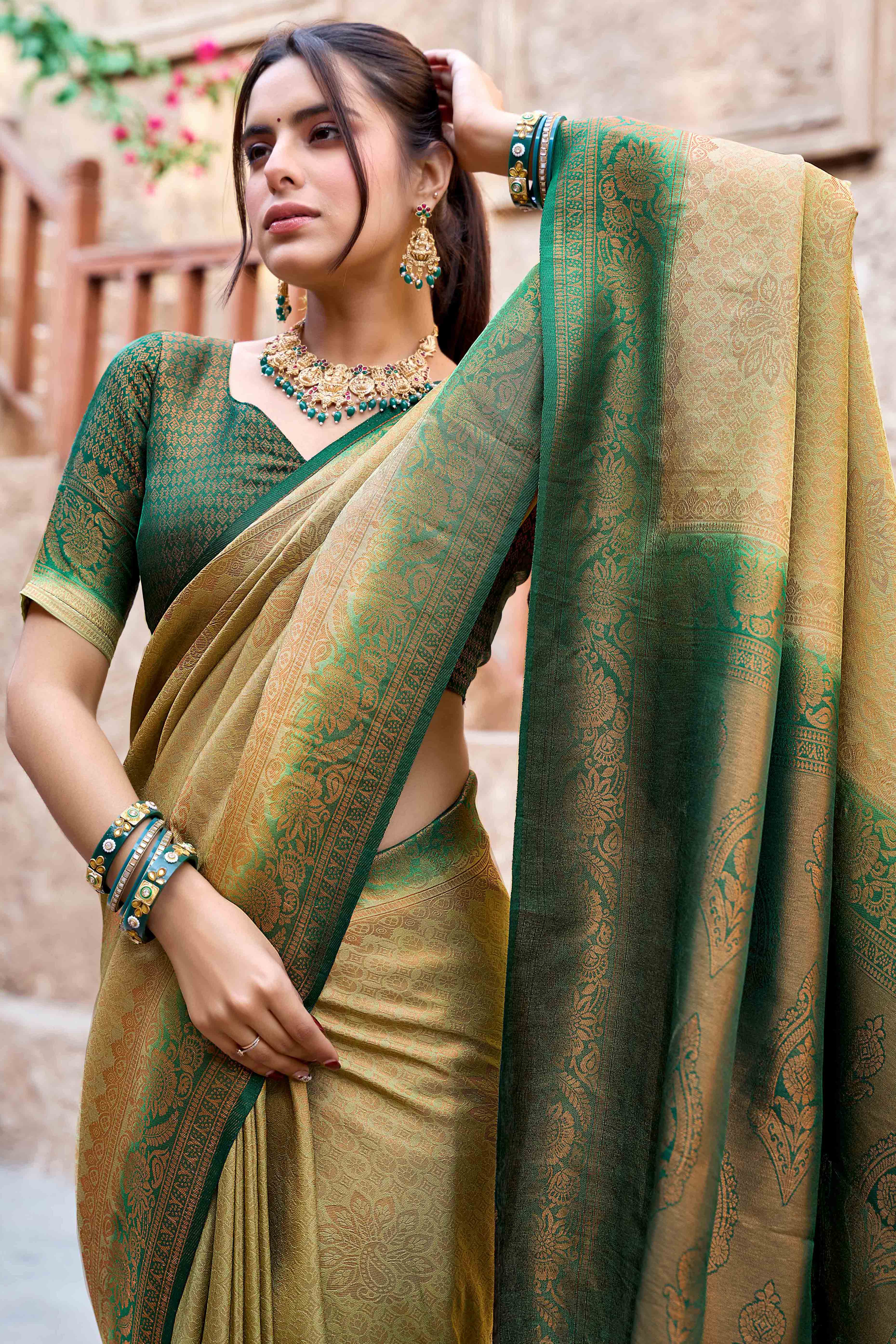 Pista Green Banarasi Silk Saree Featuring Elegant Floral Woven & Delicate Tassel Edging