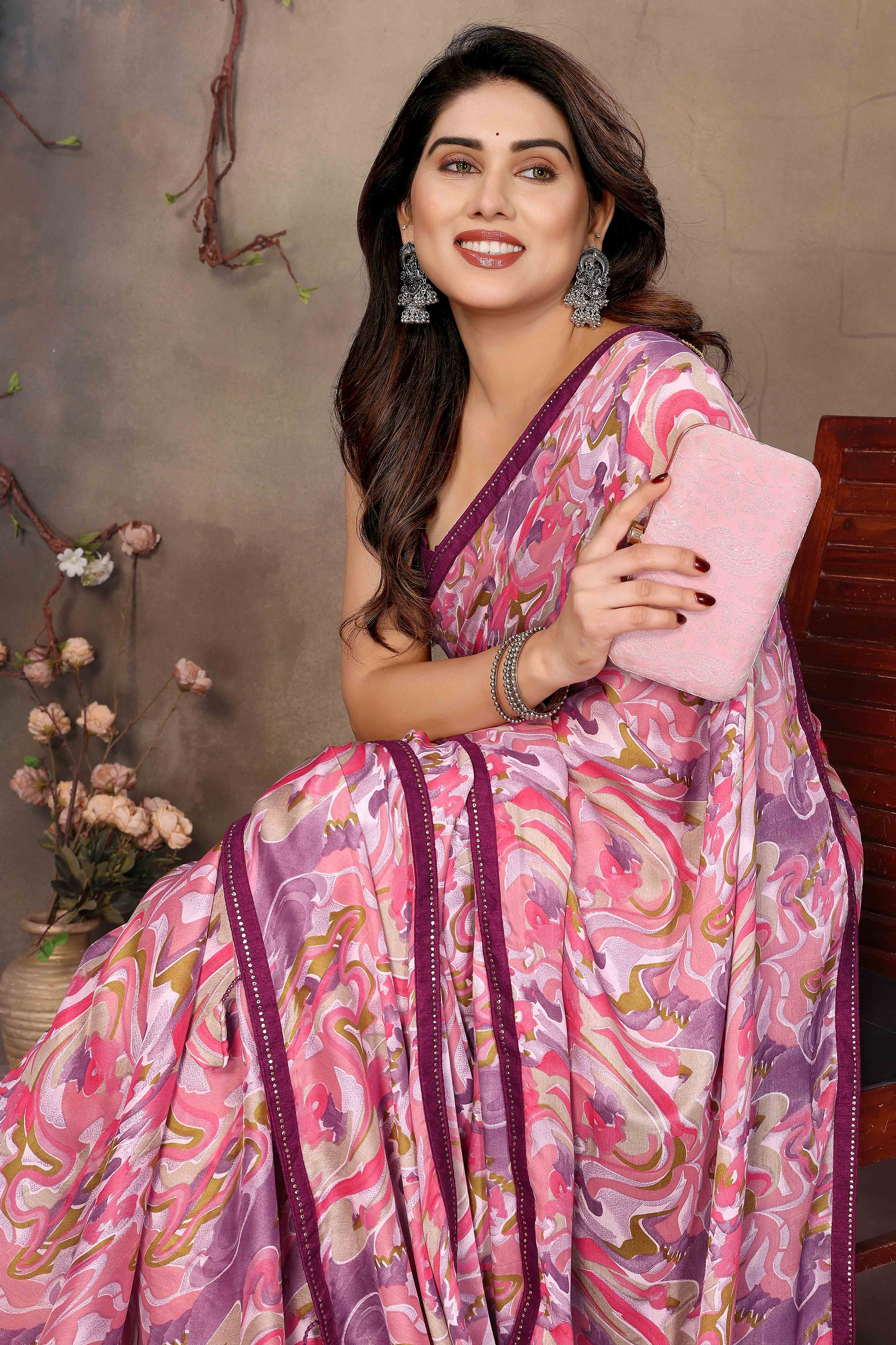 Pink Chiffon Party Saree with Vibrant Floral Patterns and Graceful Drape