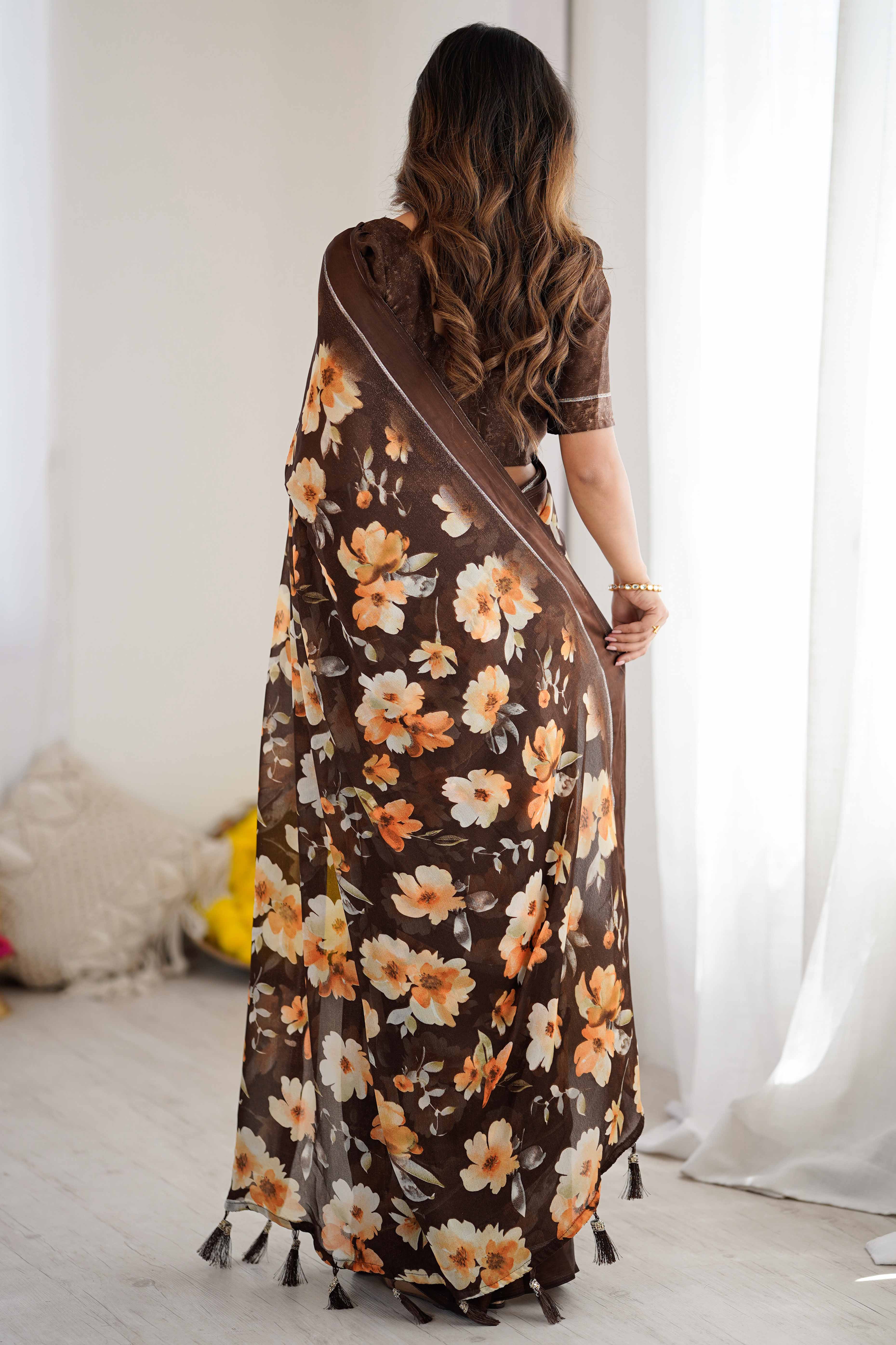 Brown Floral Printed Moss Silk Blend Saree Adorned With Playful Tassel Pallu