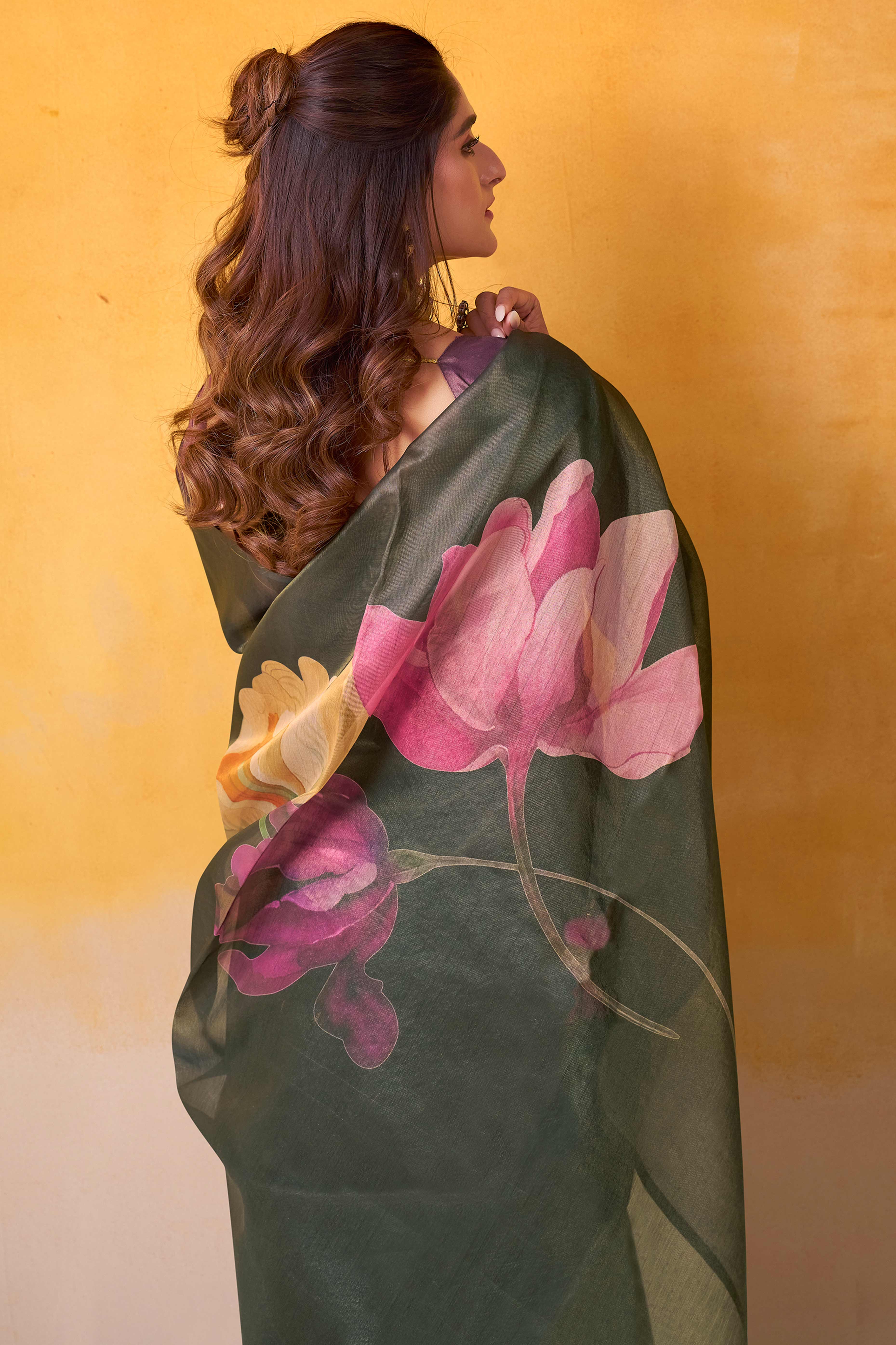 Sophisticated Black Floral Digital Print Tissue Saree Enhanced With Handmade Tassels