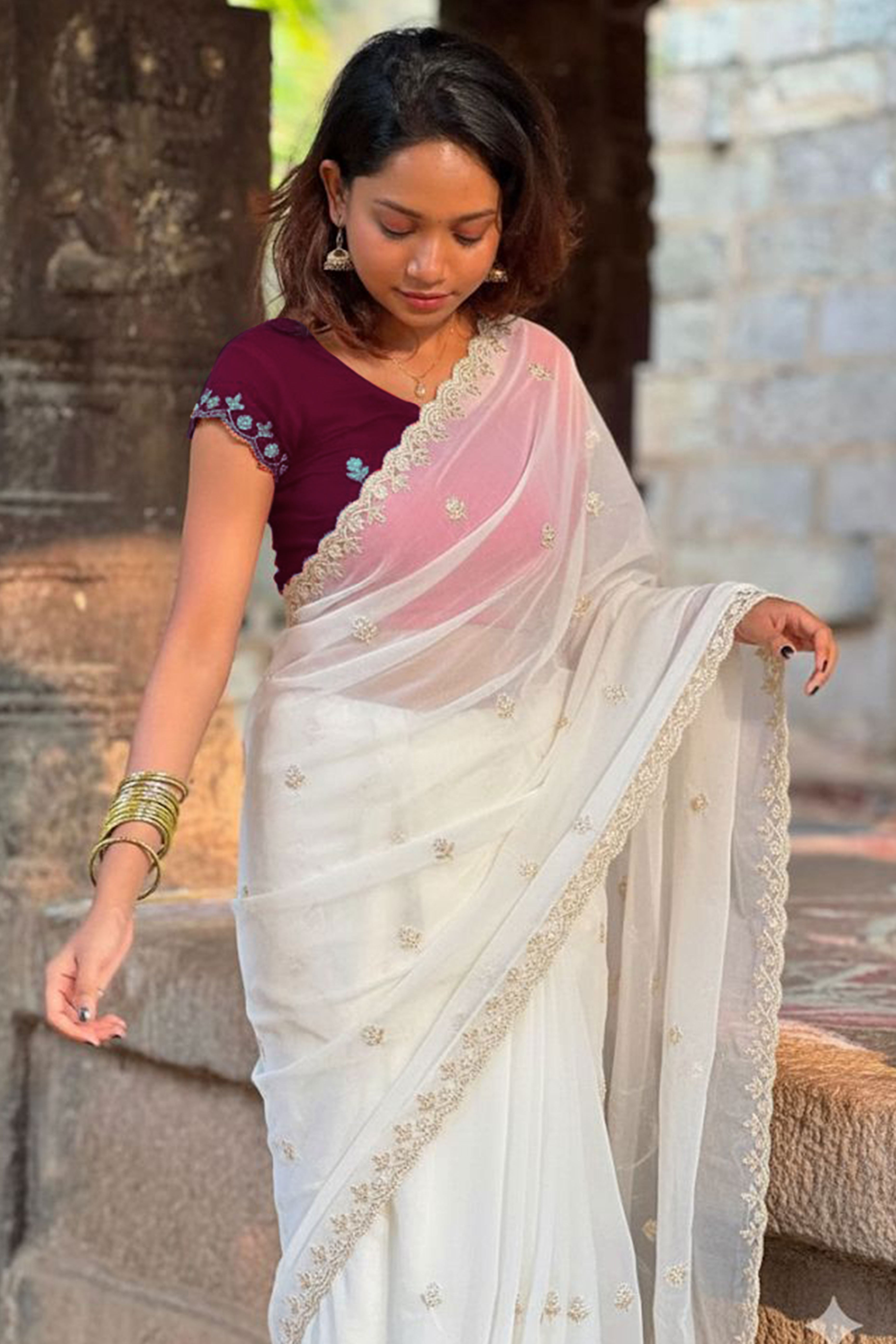 Graceful White Georgette Saree Adorned With Floral Embroidery & Moti Beads Detailing