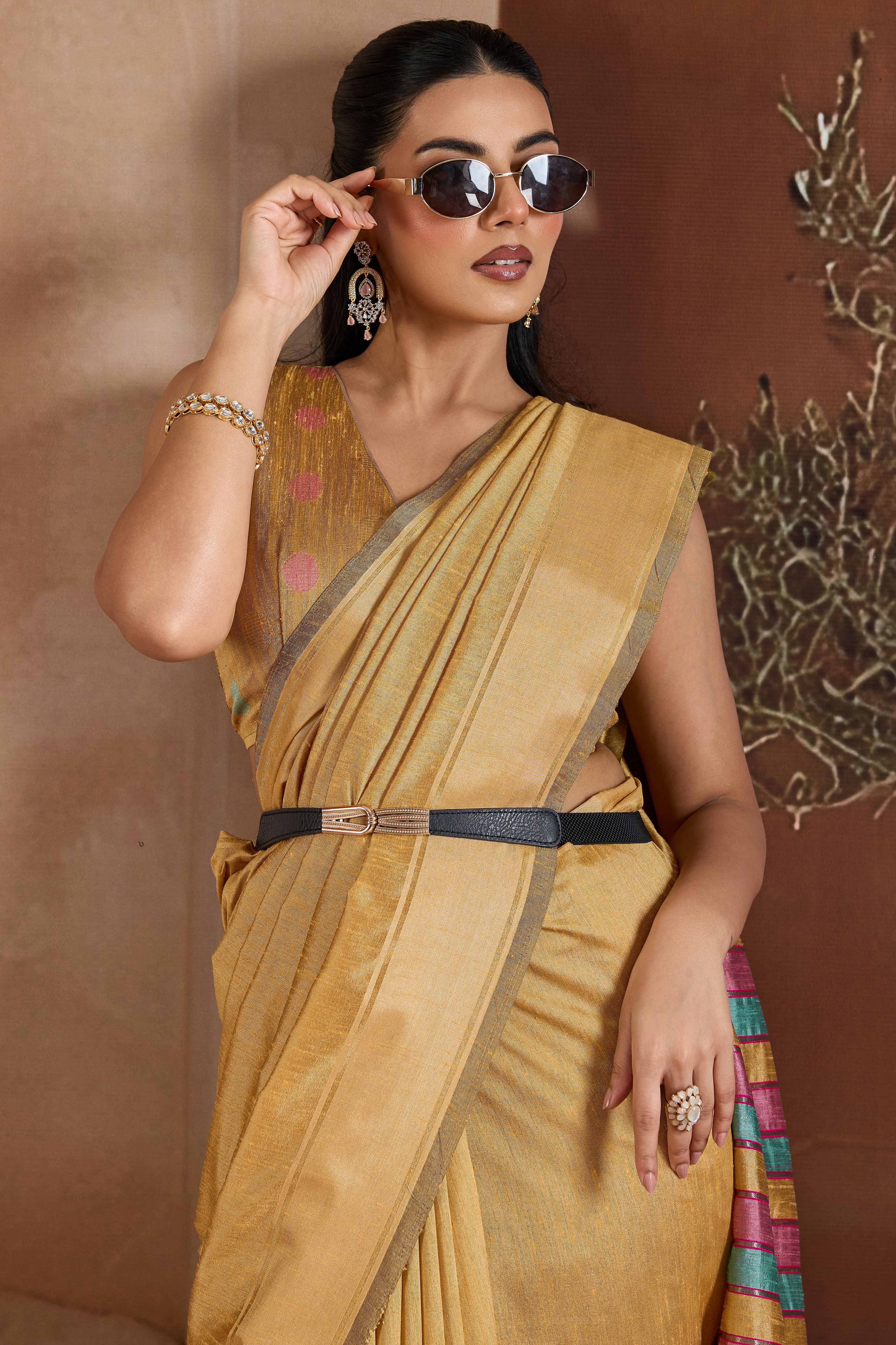 Graceful Chikoo Zari Woven Bhagalpuri Silk Saree Accented With Tassel Pallu