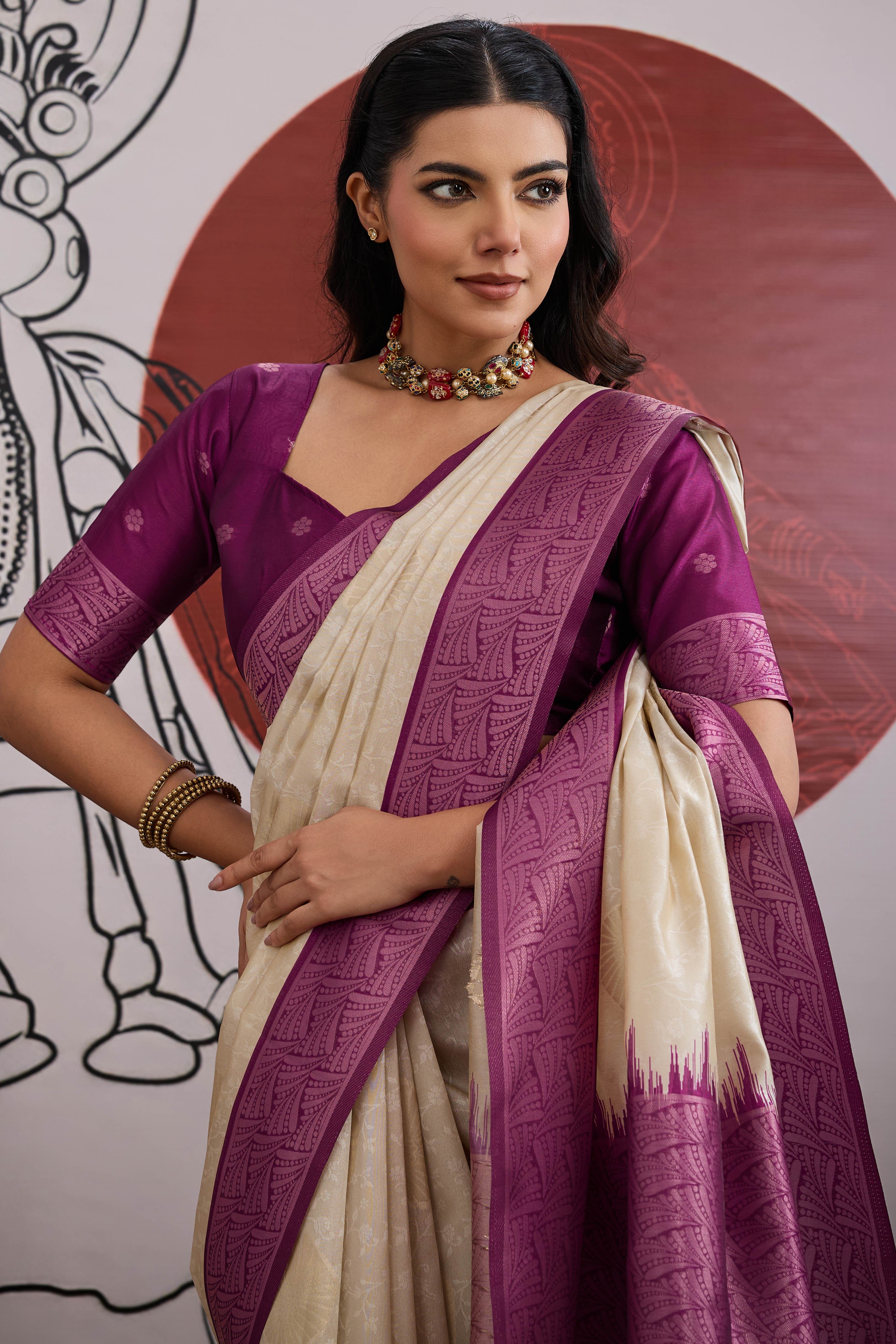 Graceful Cream & Purple Zari Weaving Silk Saree Highlighted By Decorative Tassel Pallu