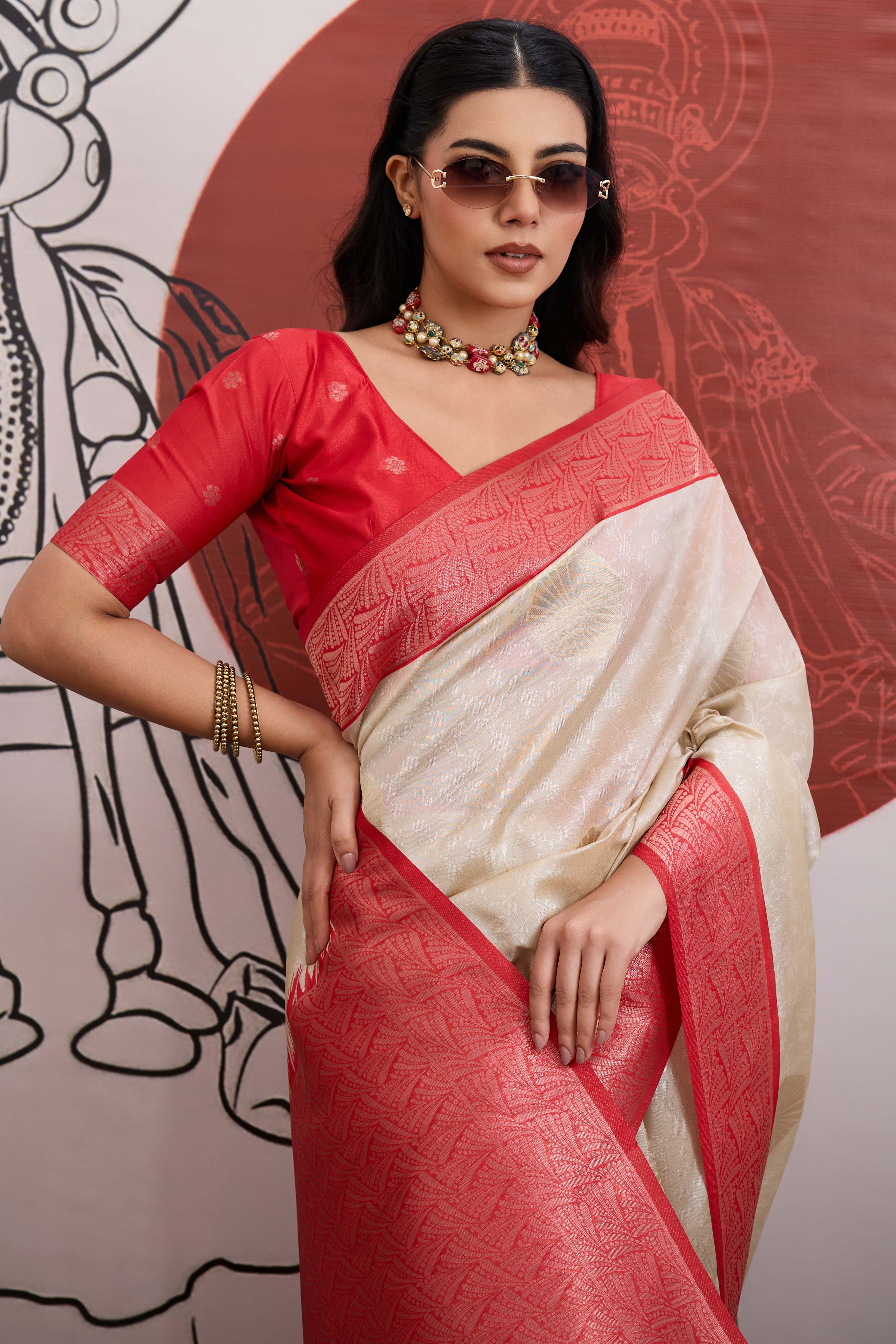 Graceful Cream & Red Zari Weaving Silk Saree Highlighted By Decorative Tassel Pallu