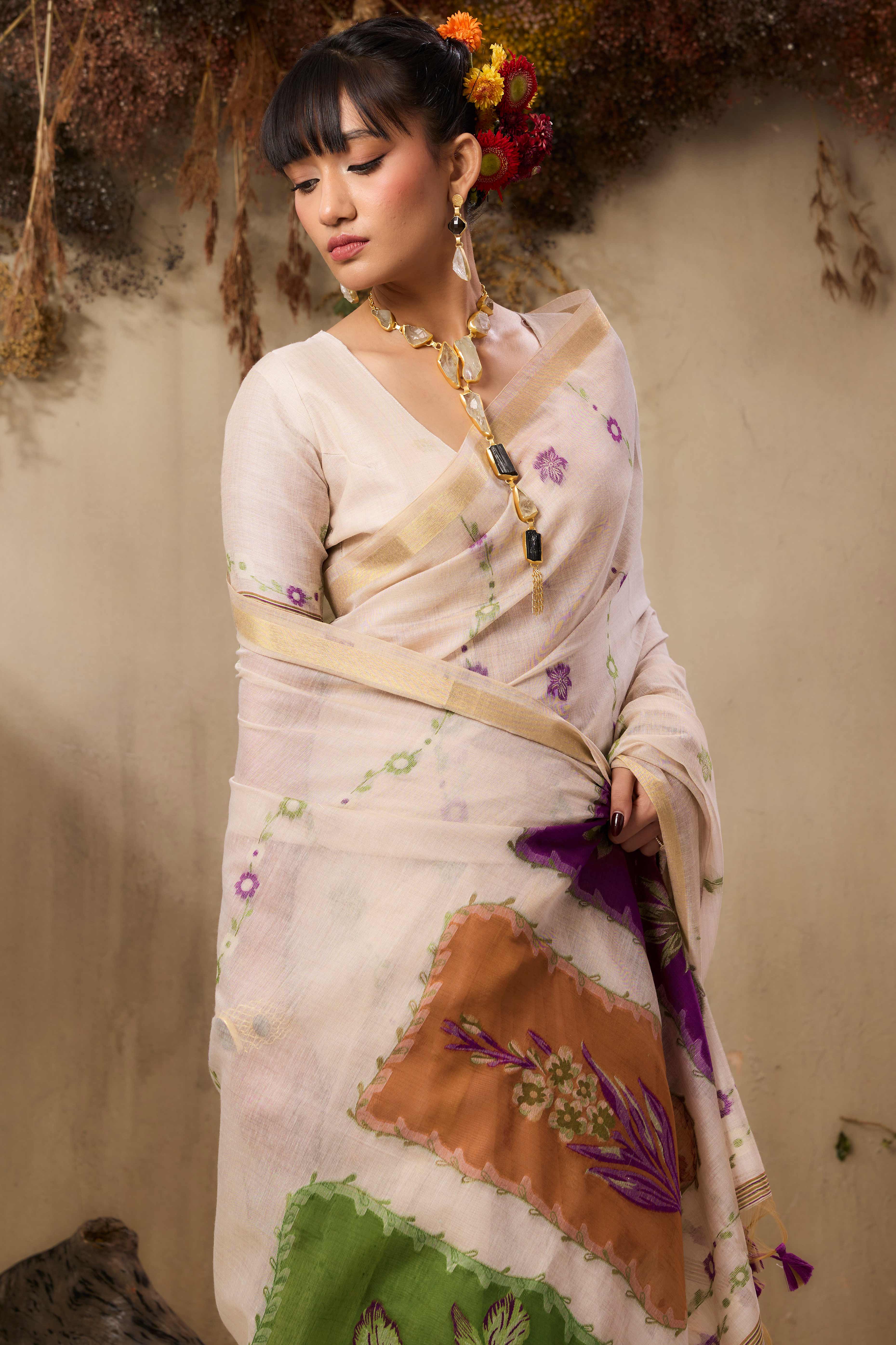 Cream Pure Munga Cotton Blend Saree Adorned with Intricate Floral Weaves