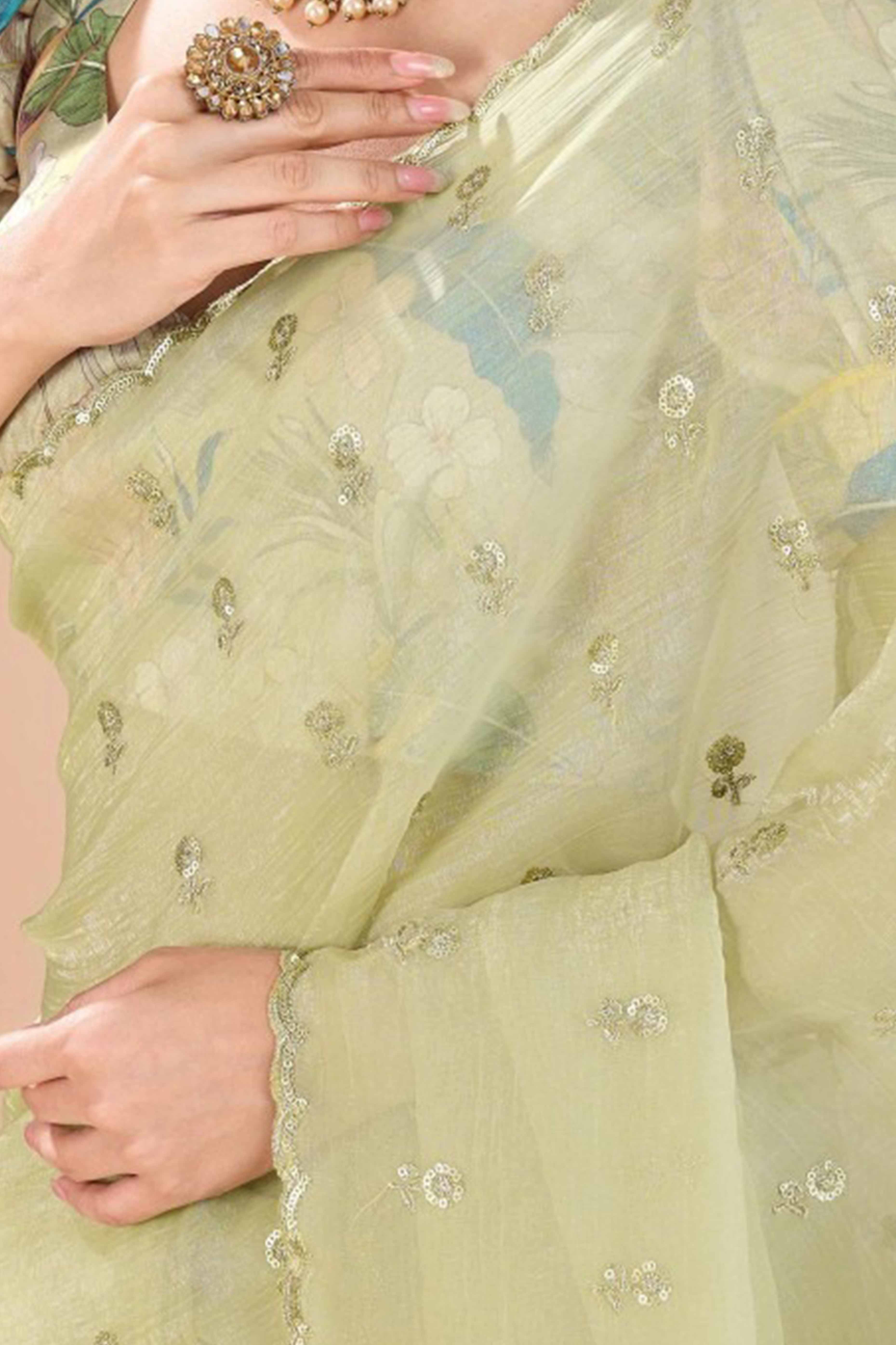 Green Crunchy Saree Adorned With Floral Sequins Embroidery & Graceful Border Finish