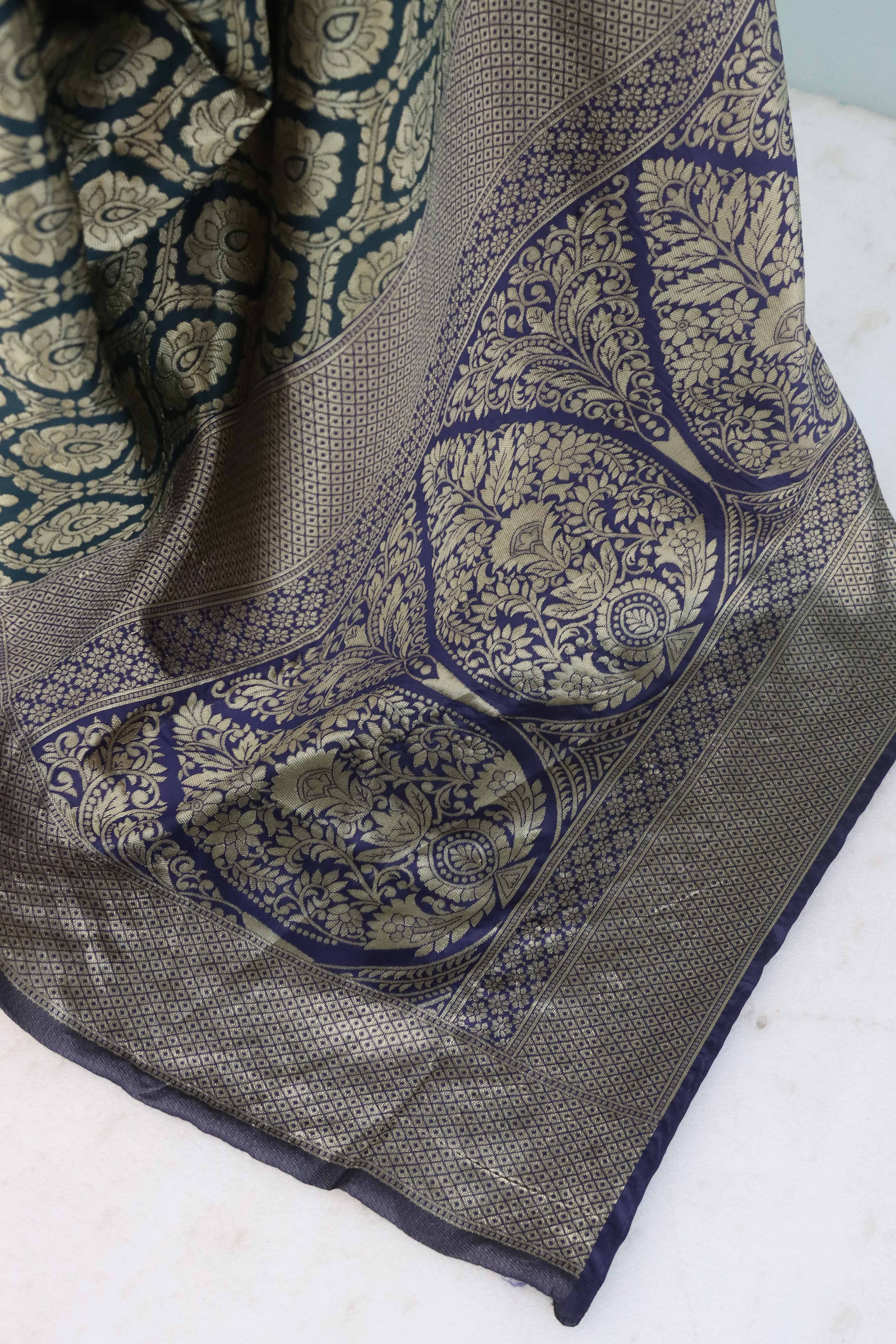 Charming Dark Teal Banarasi Silk Saree Adorned With Floral Zari Weaving