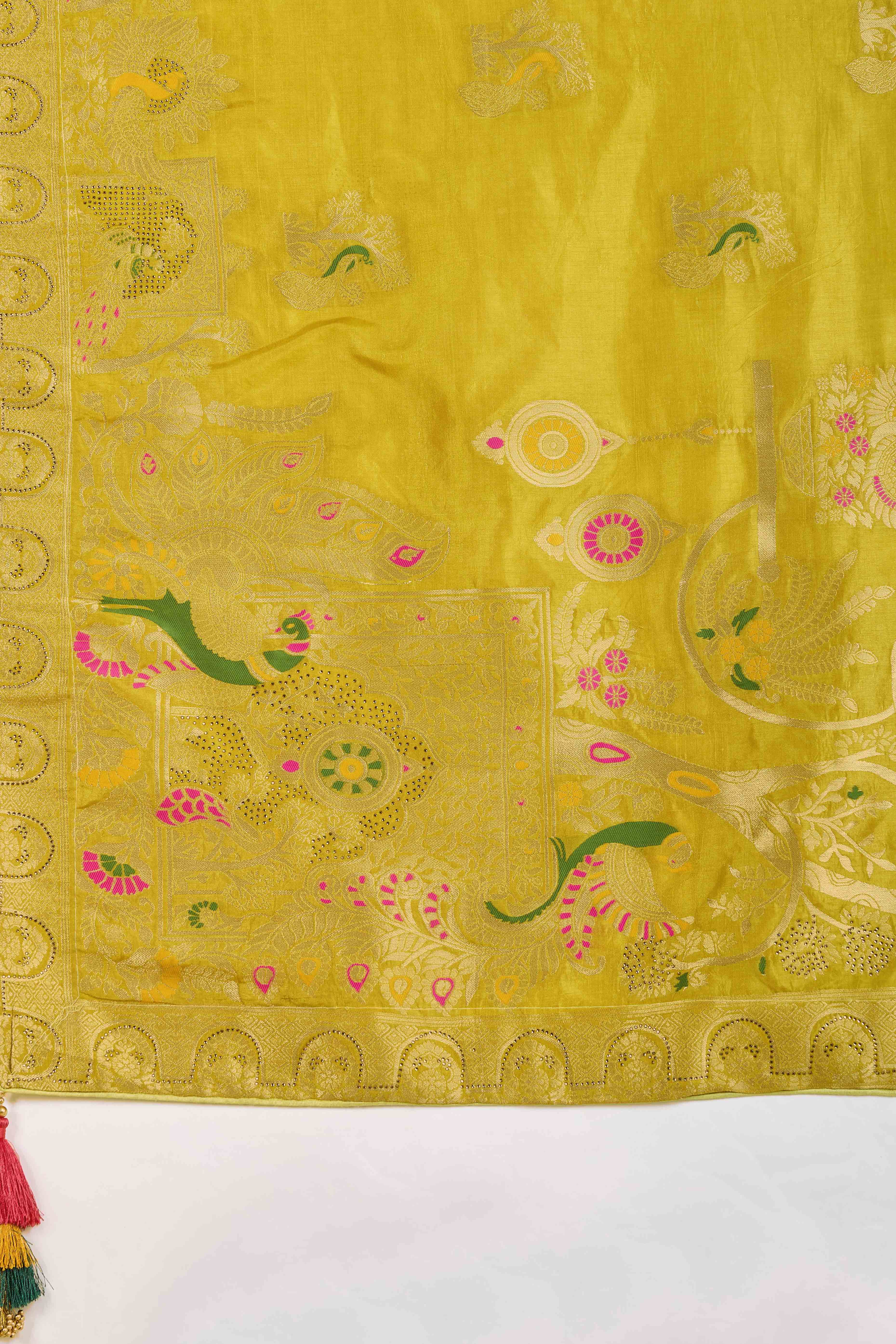 Graceful Green Dola Silk Saree With Intricate Zari Weaving & Sparkling Swarovski Accents