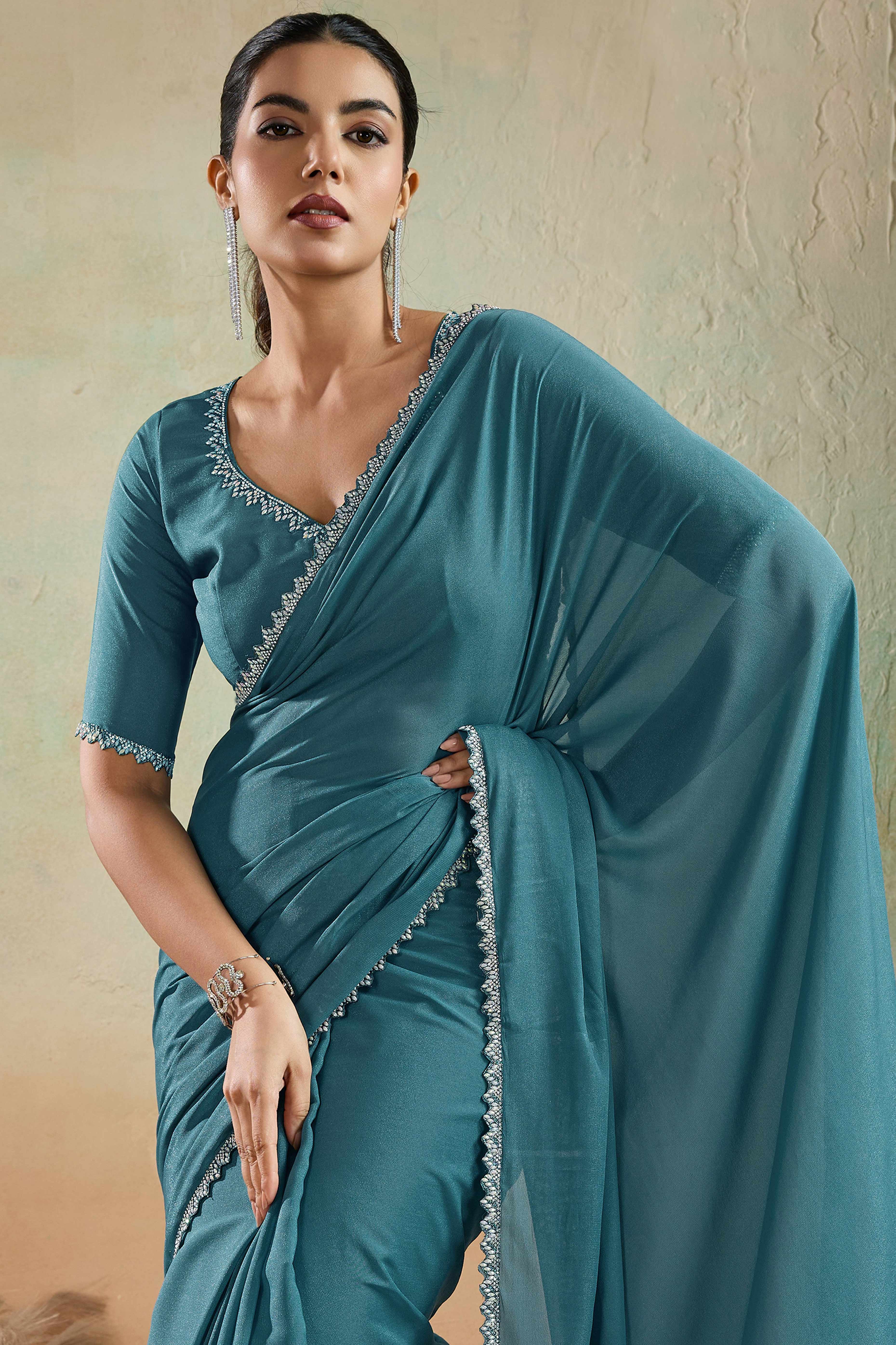 Teal Blue Solid Matt Georgette Saree With Ceramic Embellished Lace Border