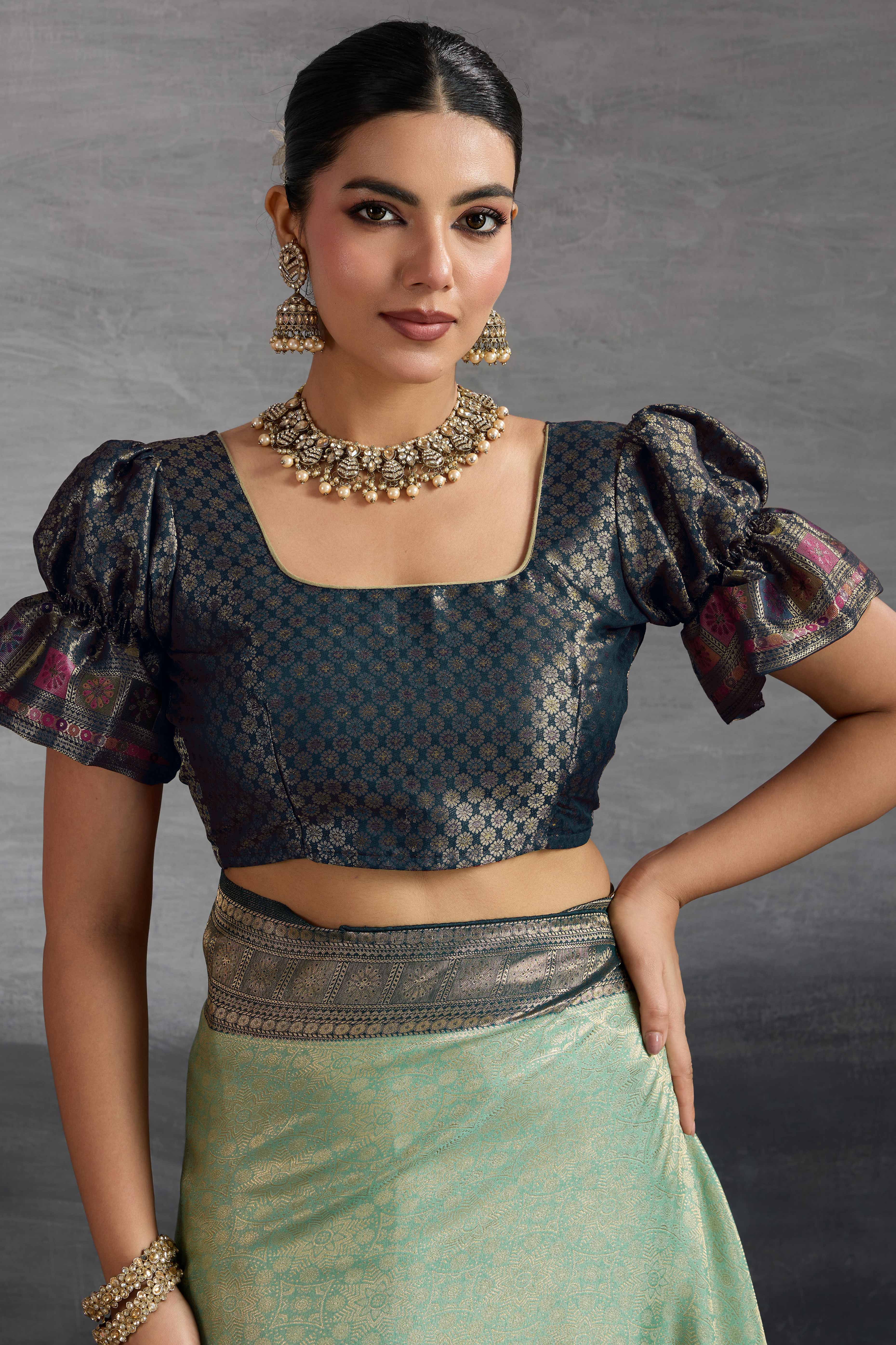 Sea Green Silk Kanjivaram Silk Saree Enhanced With Meenakari Weaving Borders