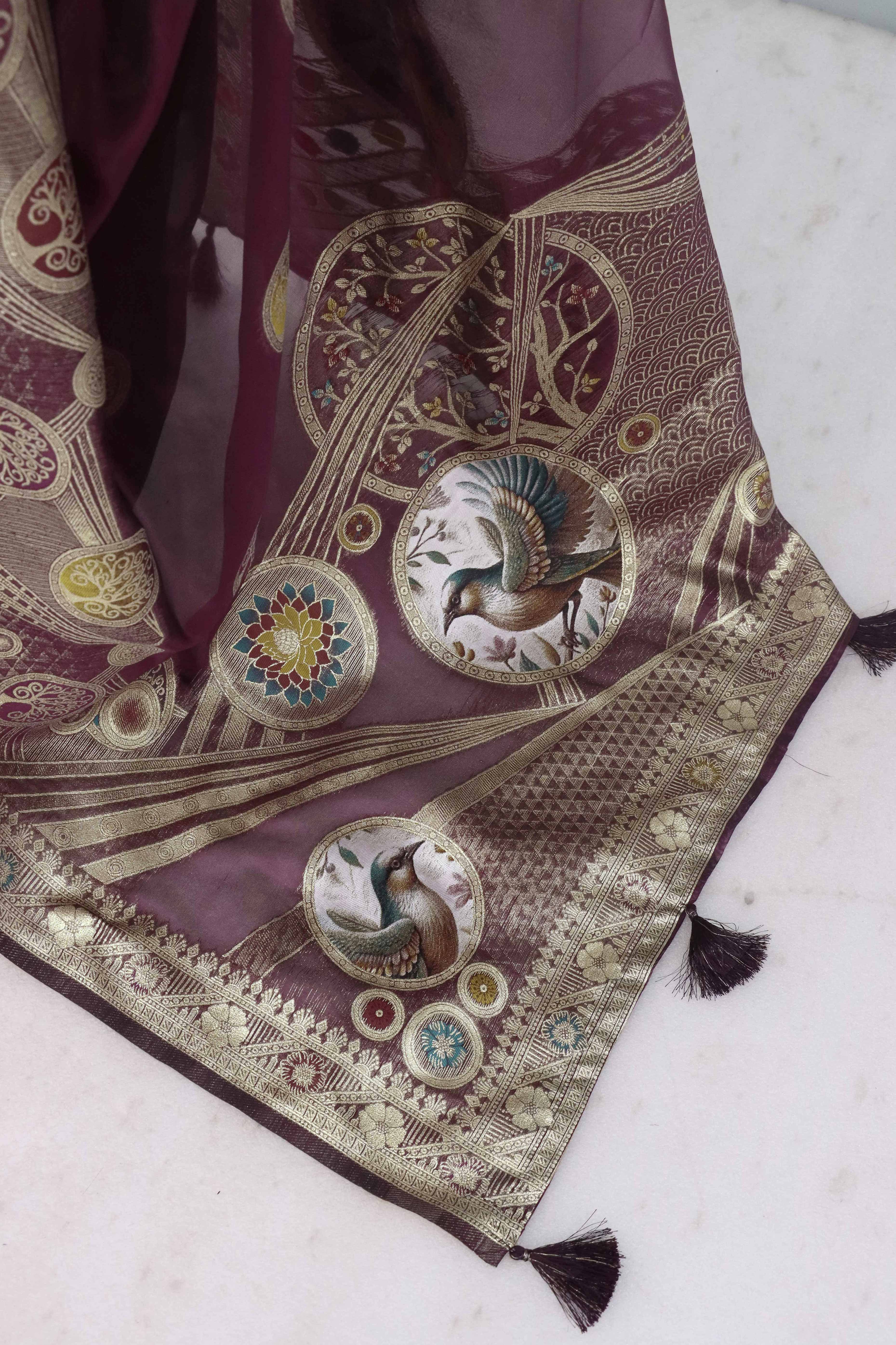 Charming Wine Zari Woven Floral Organza Saree Accented With Digital Printed Pallu & Latkan
