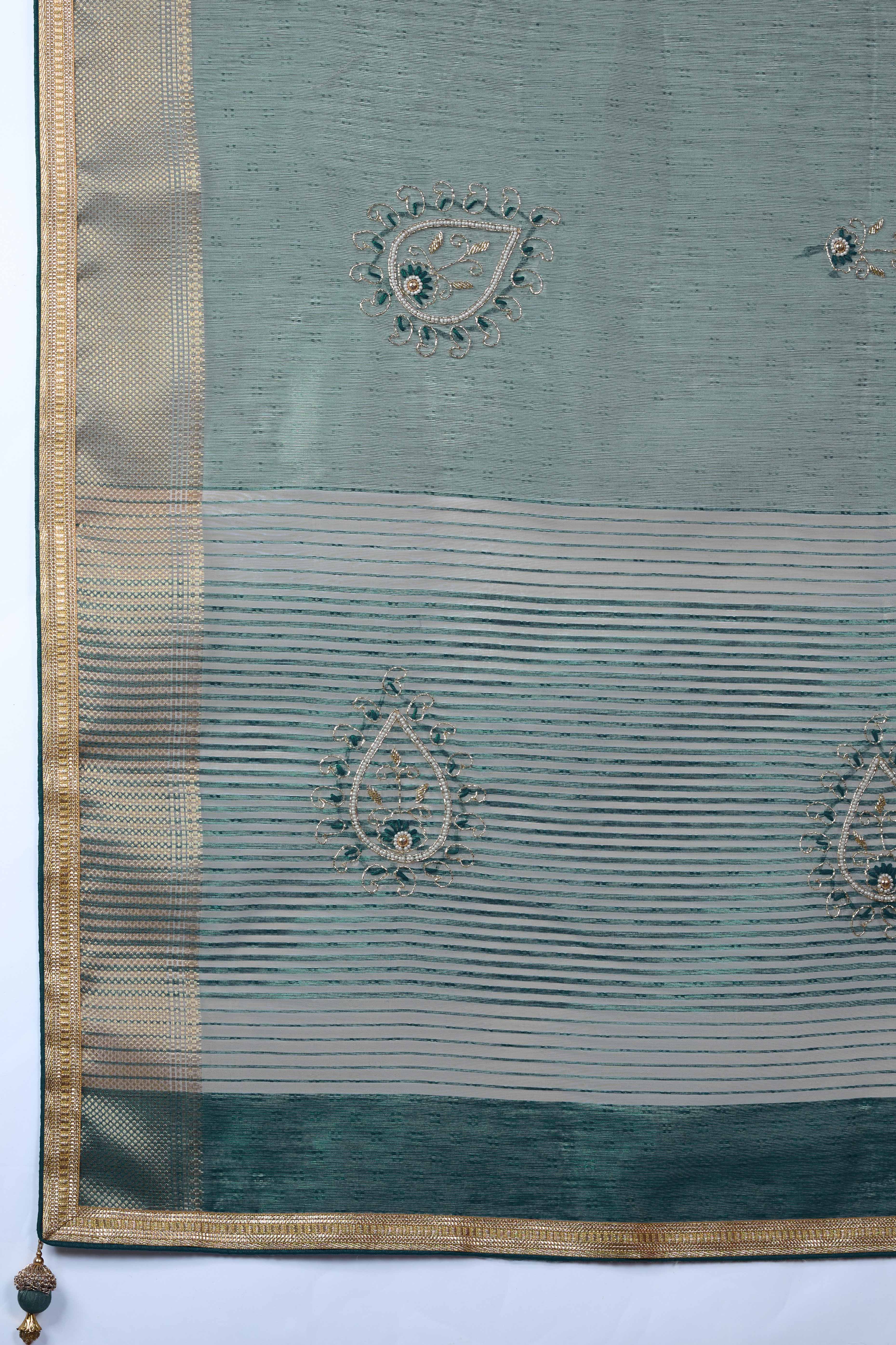 Greyish Green Woven Linen Tissue Saree Featuring Beads Embellishment