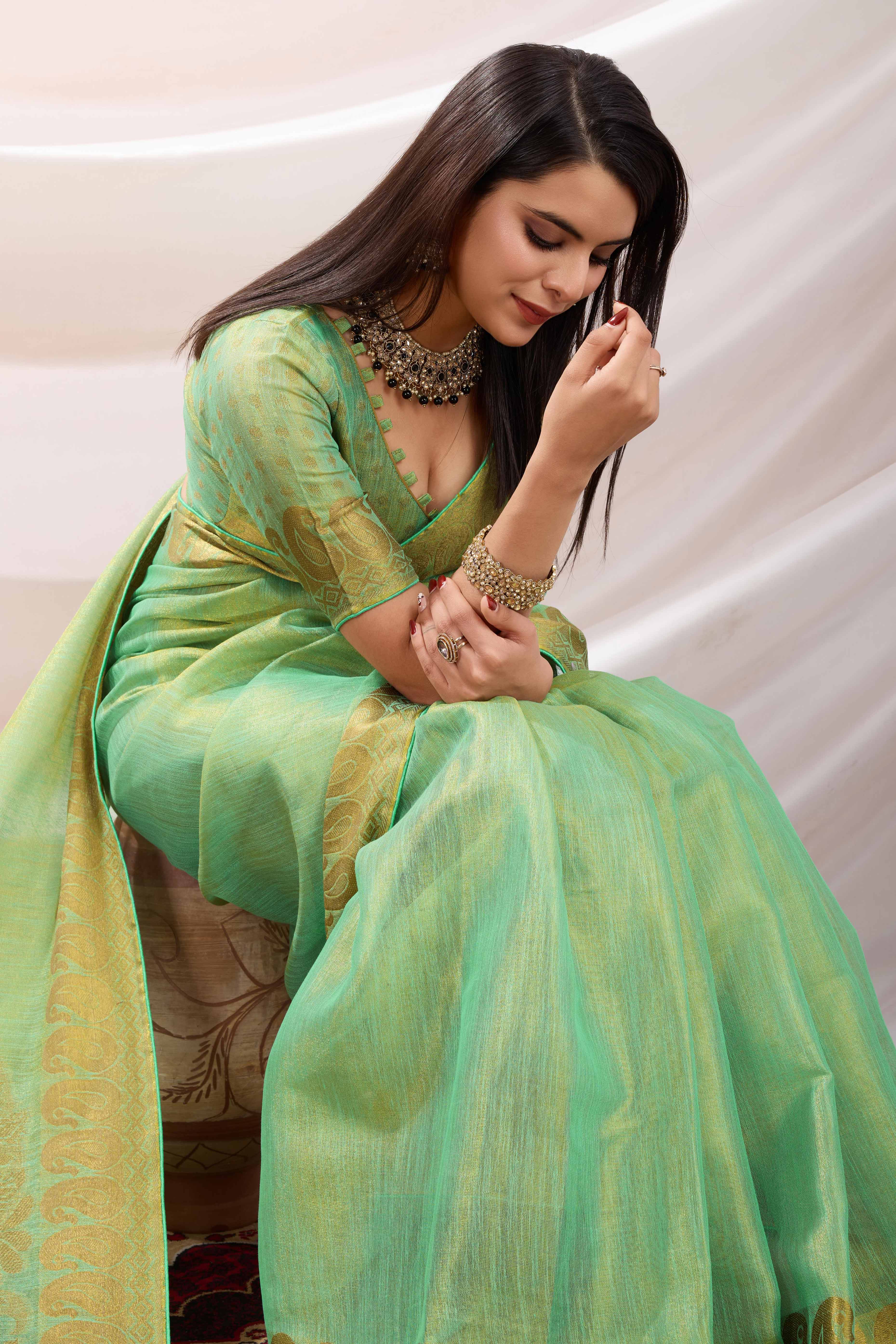 Sea Green Festive Linen Tissue Saree with Zari Borders