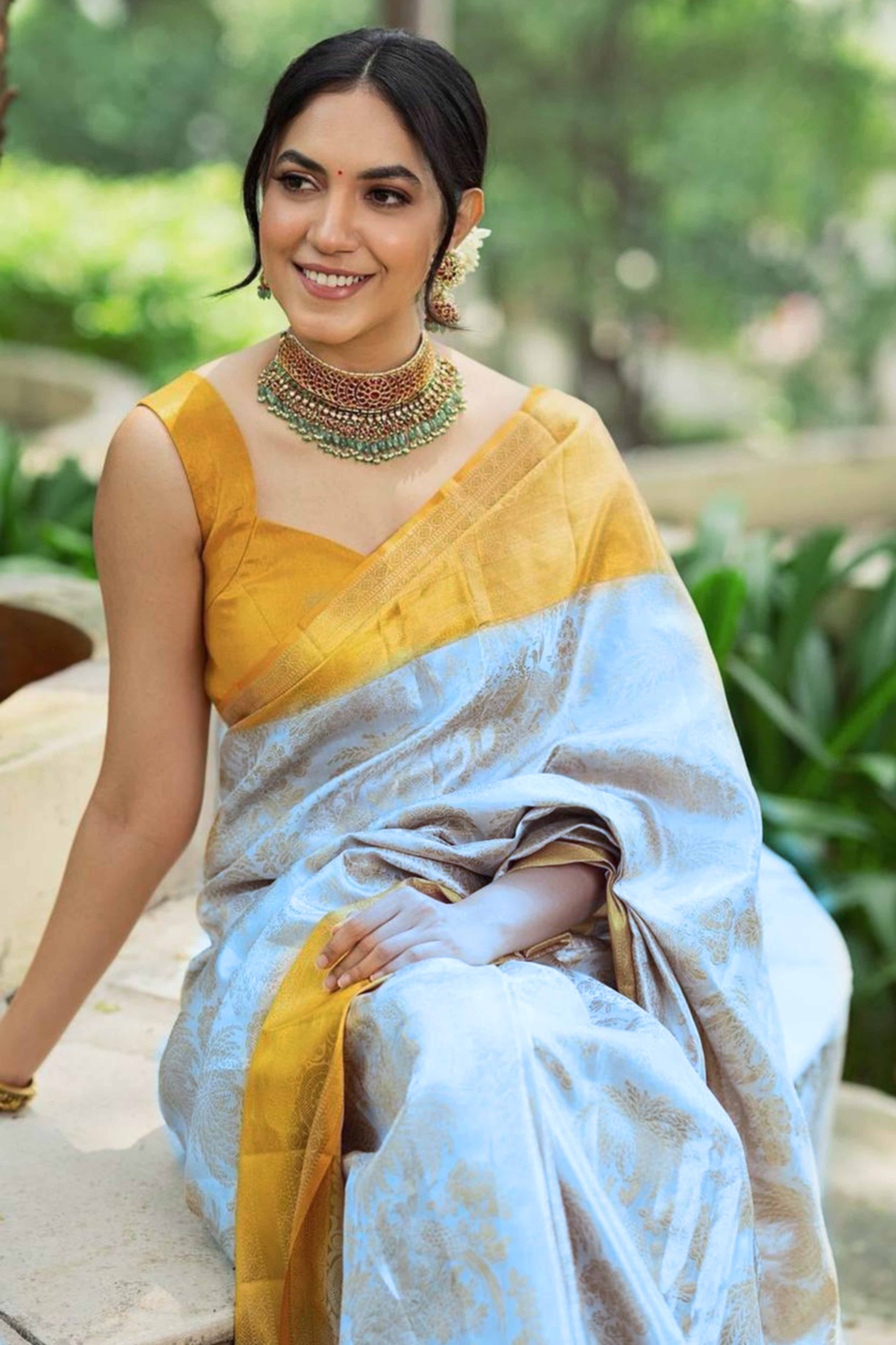 Charming White & Yellow Floral Zari Woven Lichi Banarasi Silk Saree