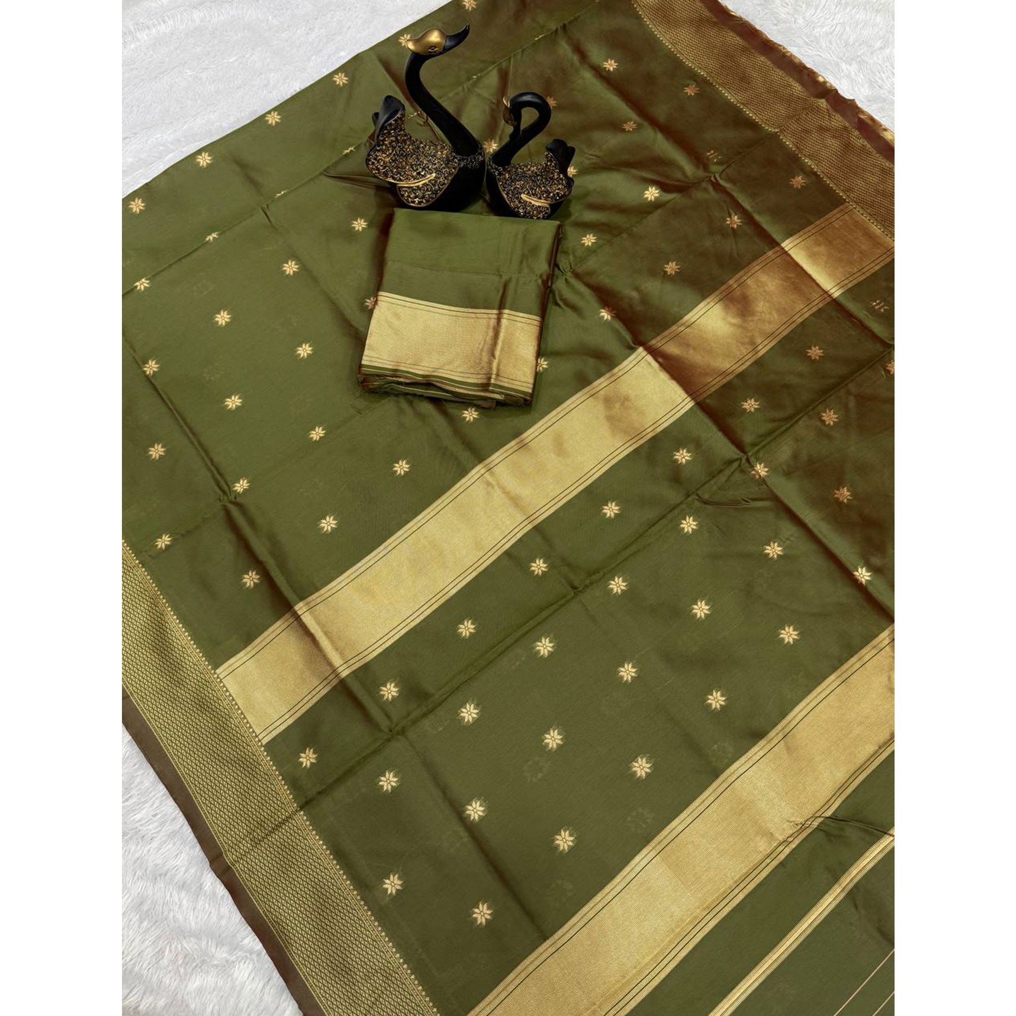 Exquisite Mehendi Green Floral Zari Woven Lichi Banarasi Silk Saree