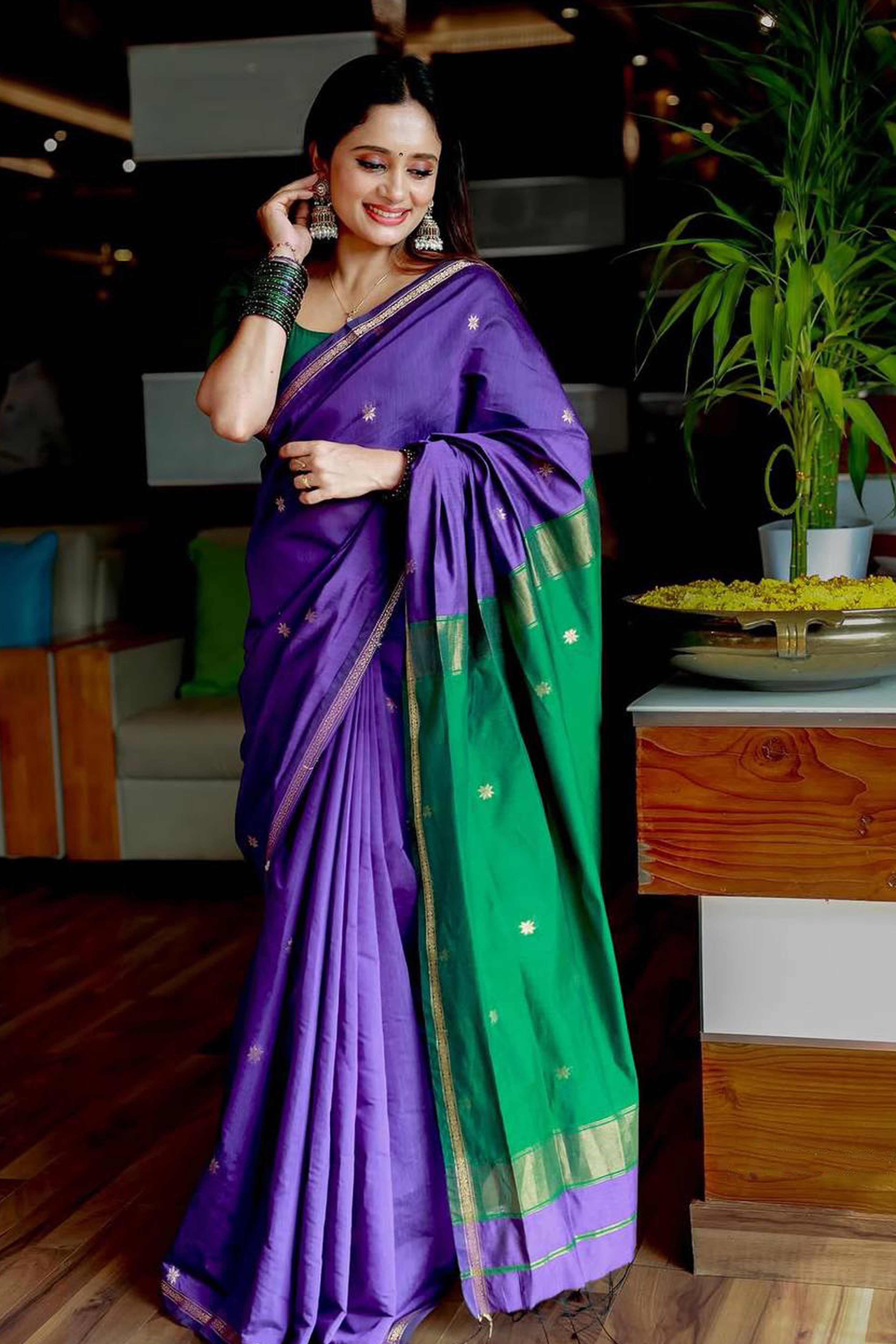Purple Linen Cotton Saree Adorned with Intricate Zari Butti Weaving for a Refined Ethnic Appeal