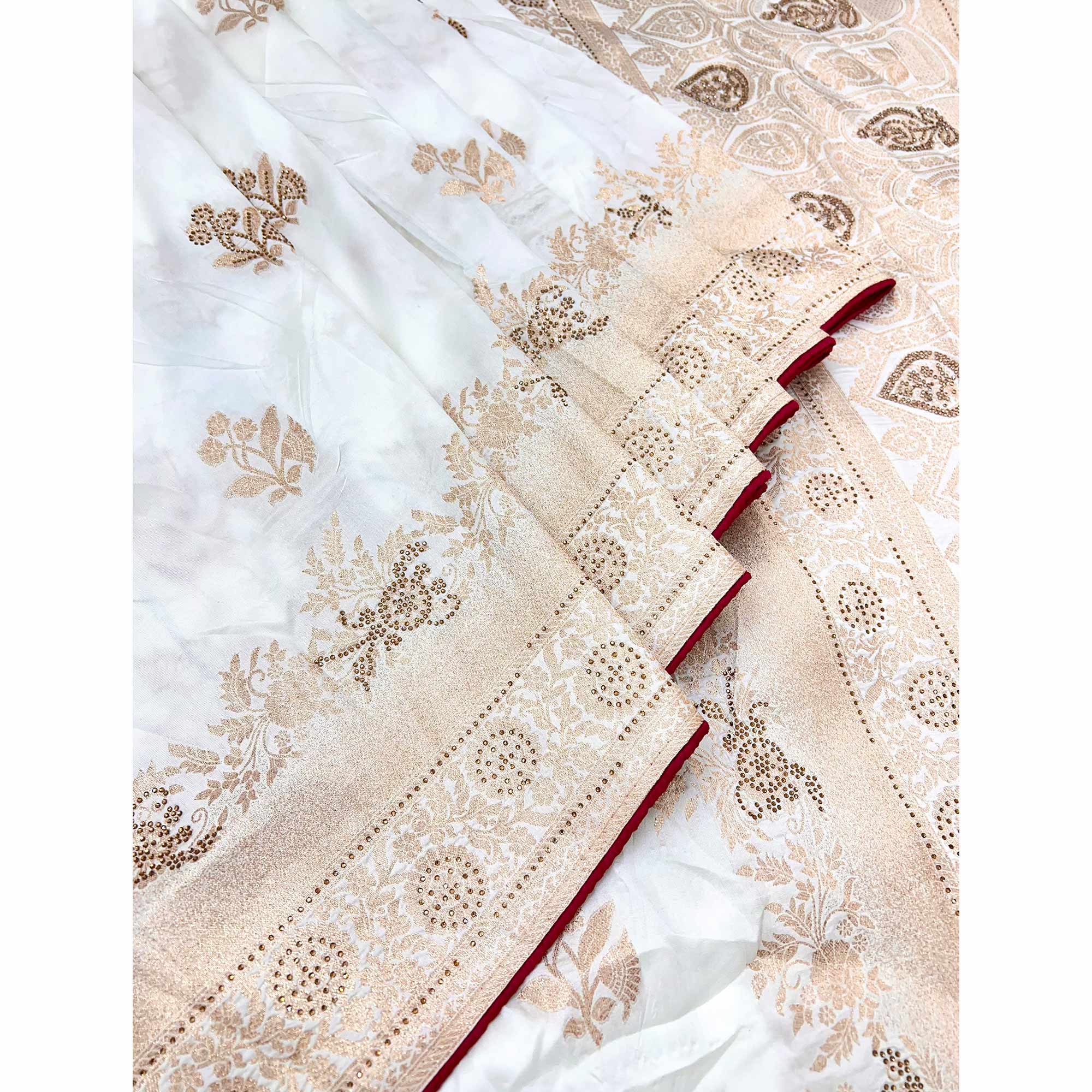 Offwhite Elegant White Dola Silk Saree with Intricate Weaving and Sparkling Stonework