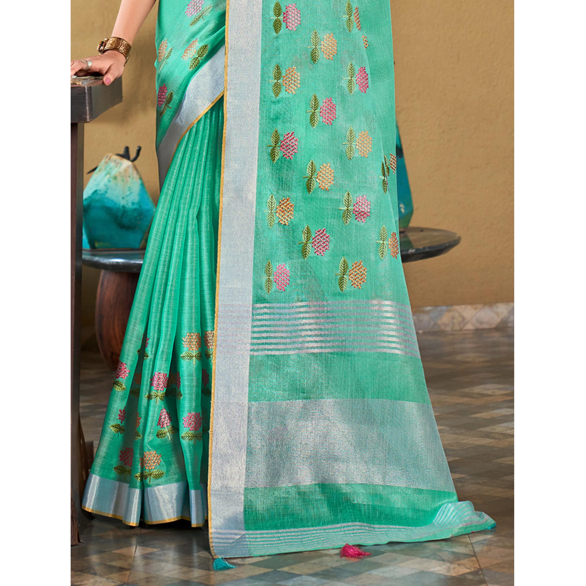 Sea Green Floral Embroidered Linen Saree With Tassels