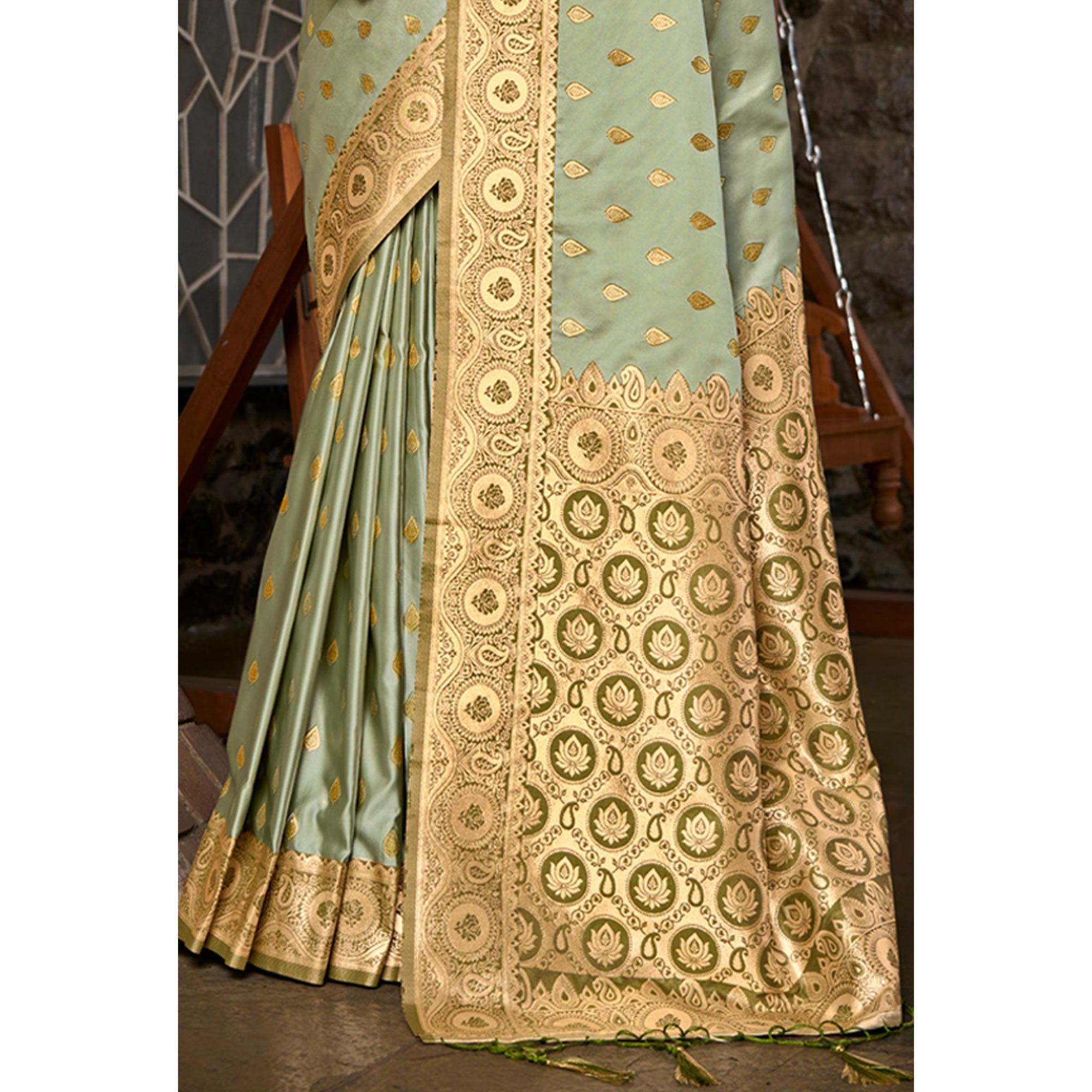 Light Green Woven Satin Silk Saree With Tassels
