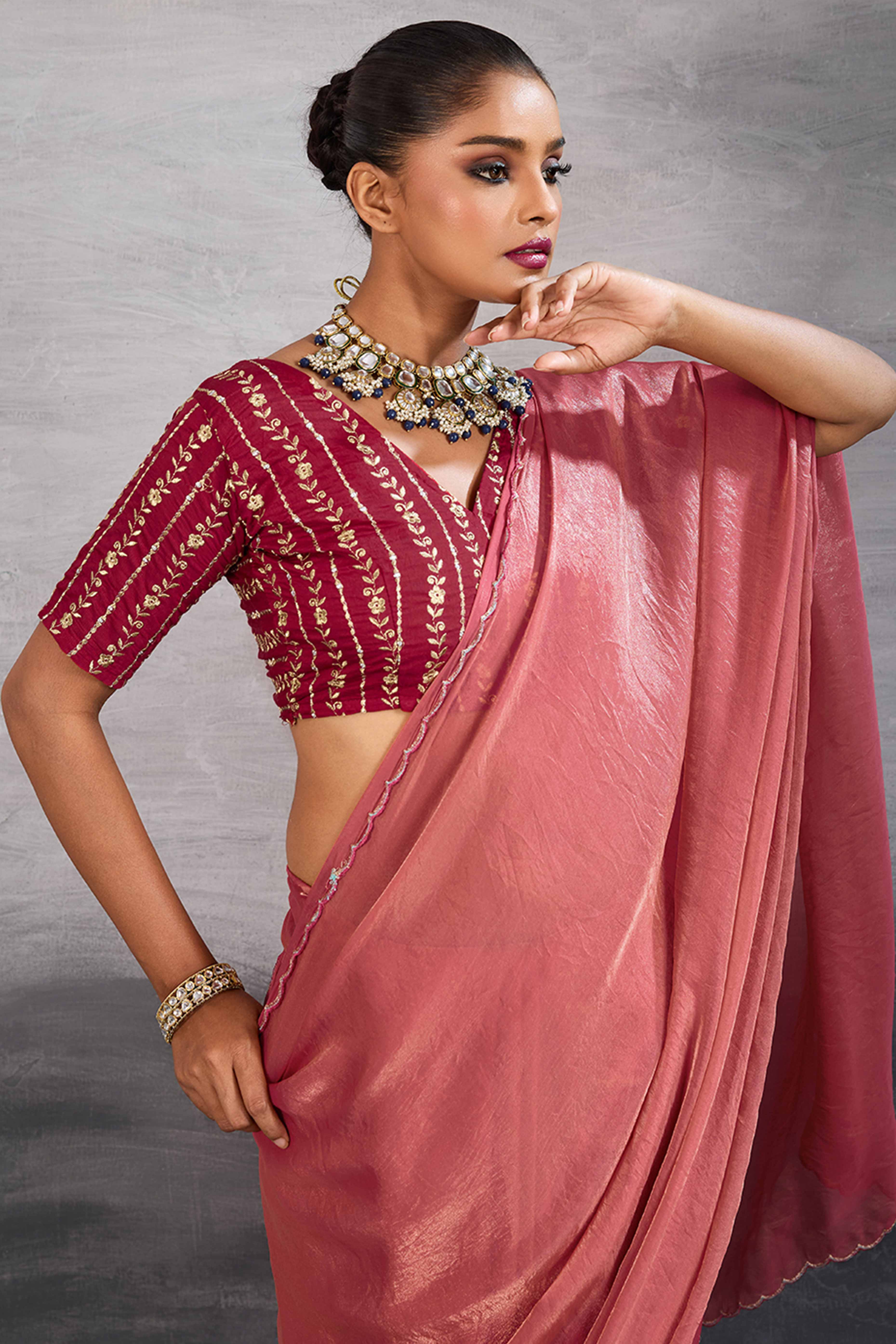 Coral Pink Solid Organza Jimmy Choo Saree Accentuated With Elegant Cutwork Border Detailing