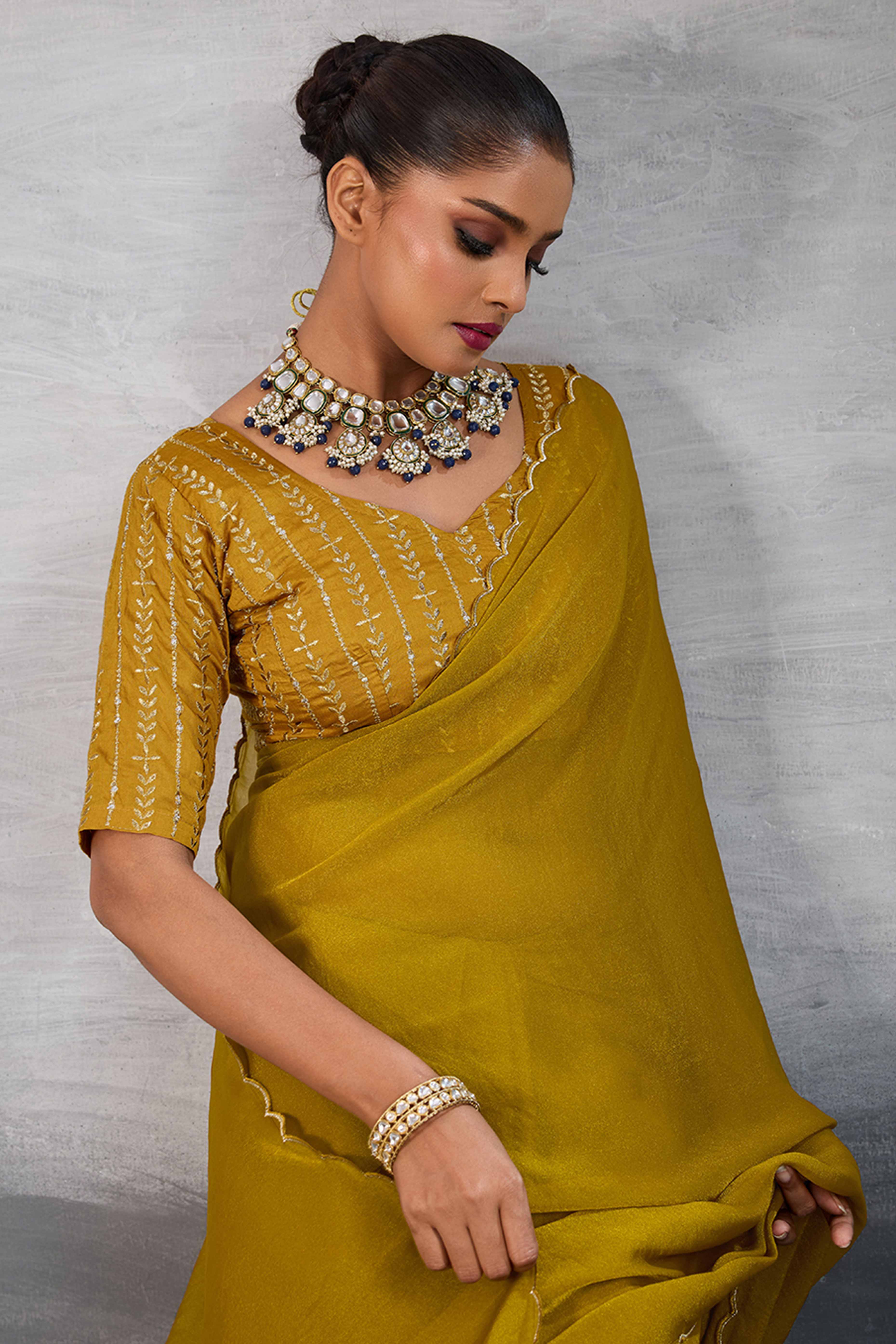 Mustard Solid Organza Jimmy Choo Saree Accentuated With Elegant Cutwork Border Detailing