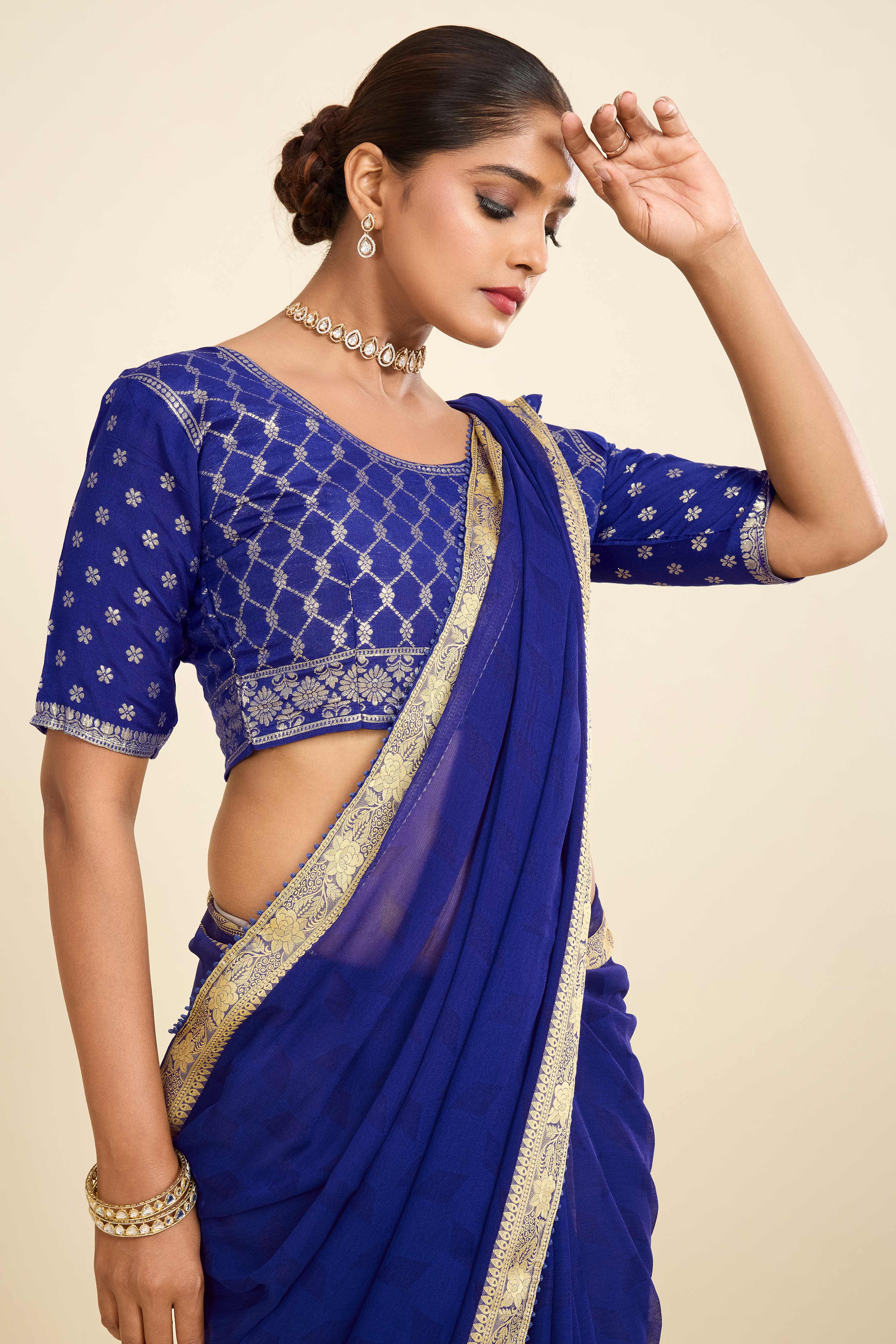 Blue Printed Chiffon Saree with Intricate Woven Edging