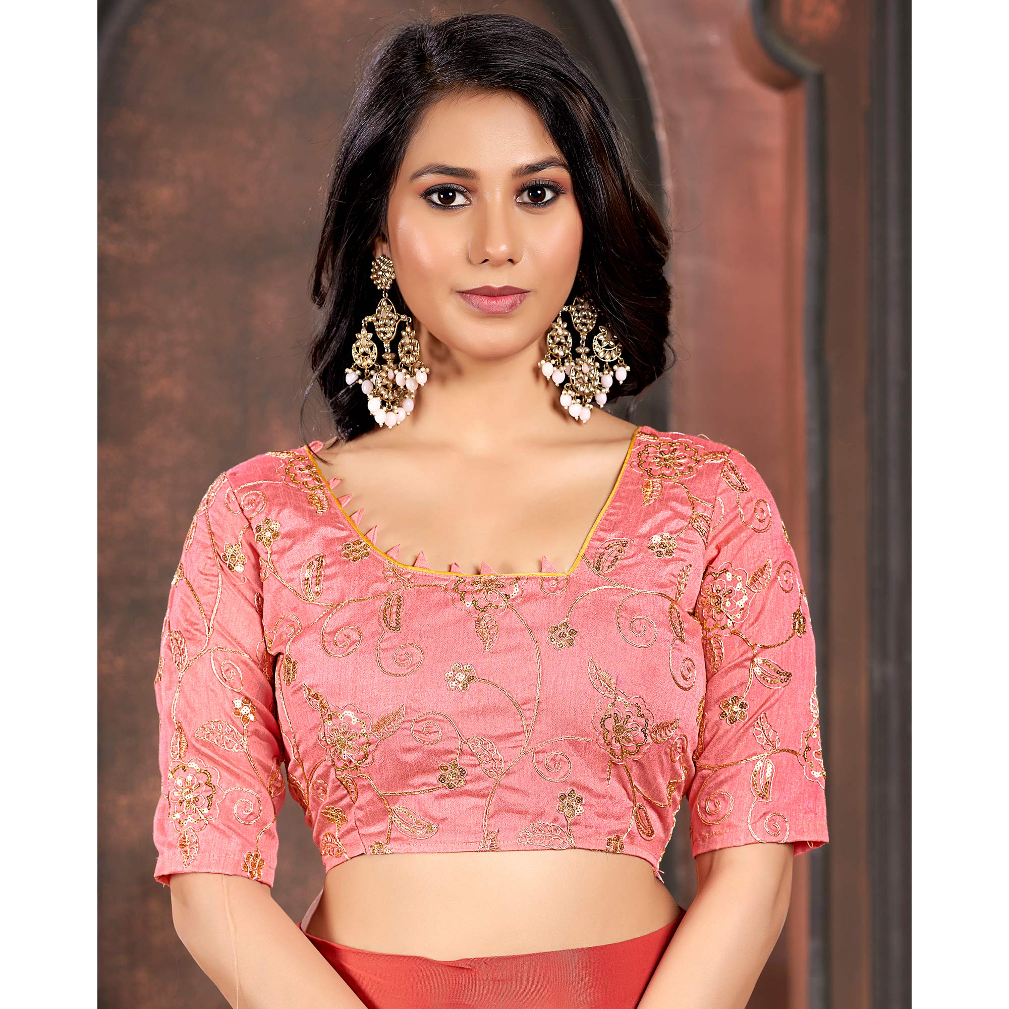 Peach Floral Printed Georgette Saree With Sequins Work Border