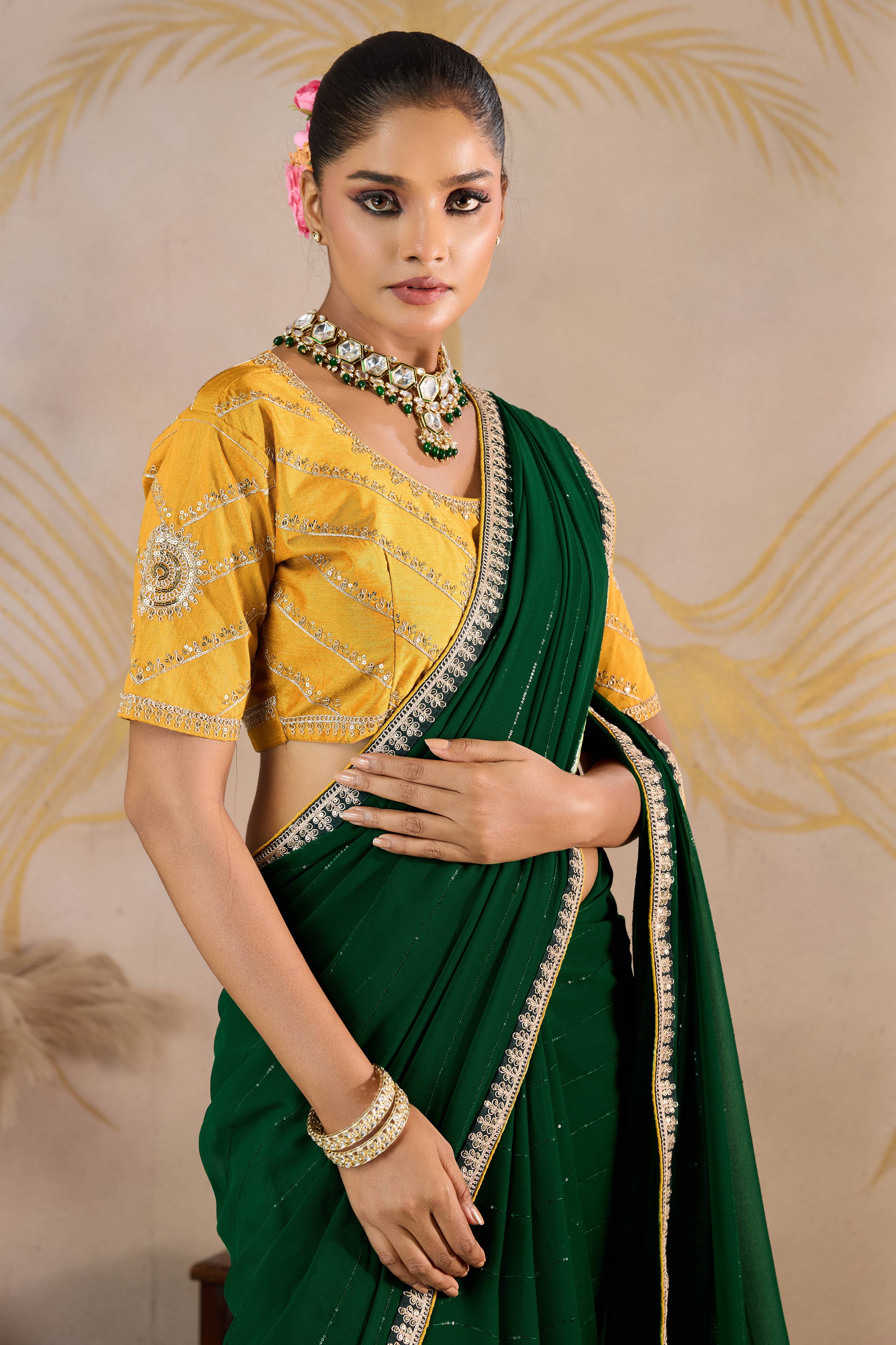 Green Zari Embroidered Georgette Saree Accented With Sequins