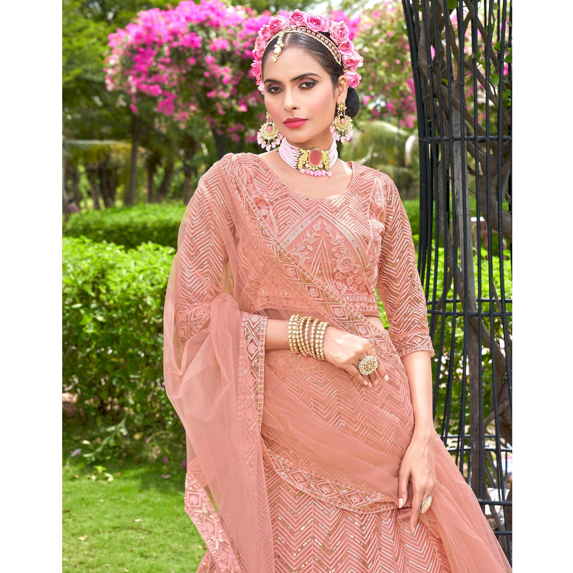 Peach Sequins Floral Embroidered Net Semi Stitched Lehenga Choli