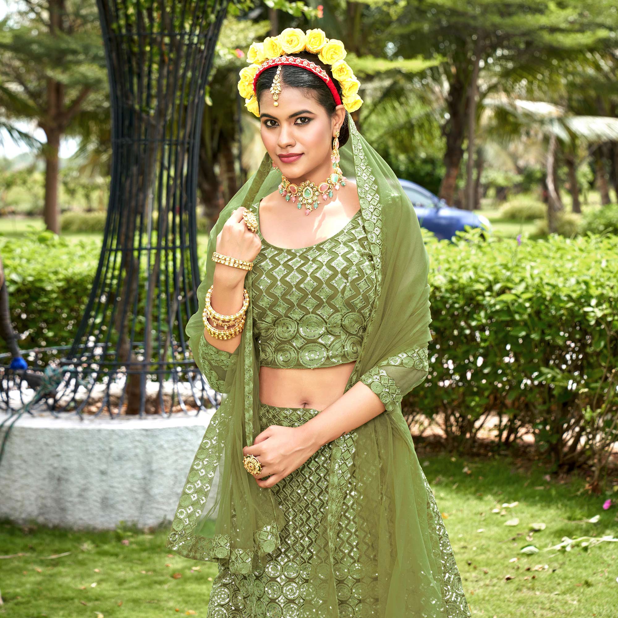 Green Sequins Embroidered Net Lehenga Choli