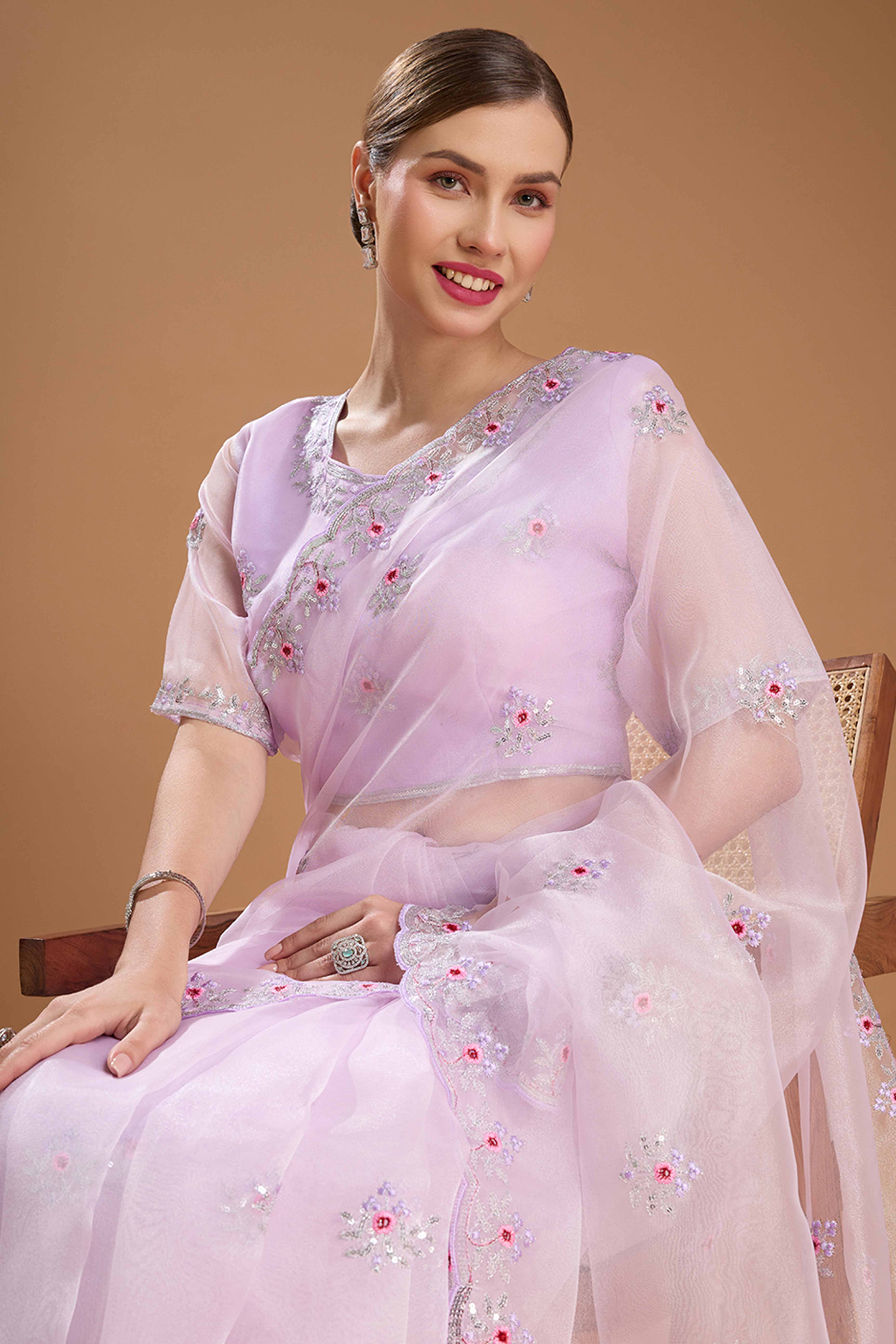 Light Lavender Net Saree Enhanced with Elegant Sequins Embellishments